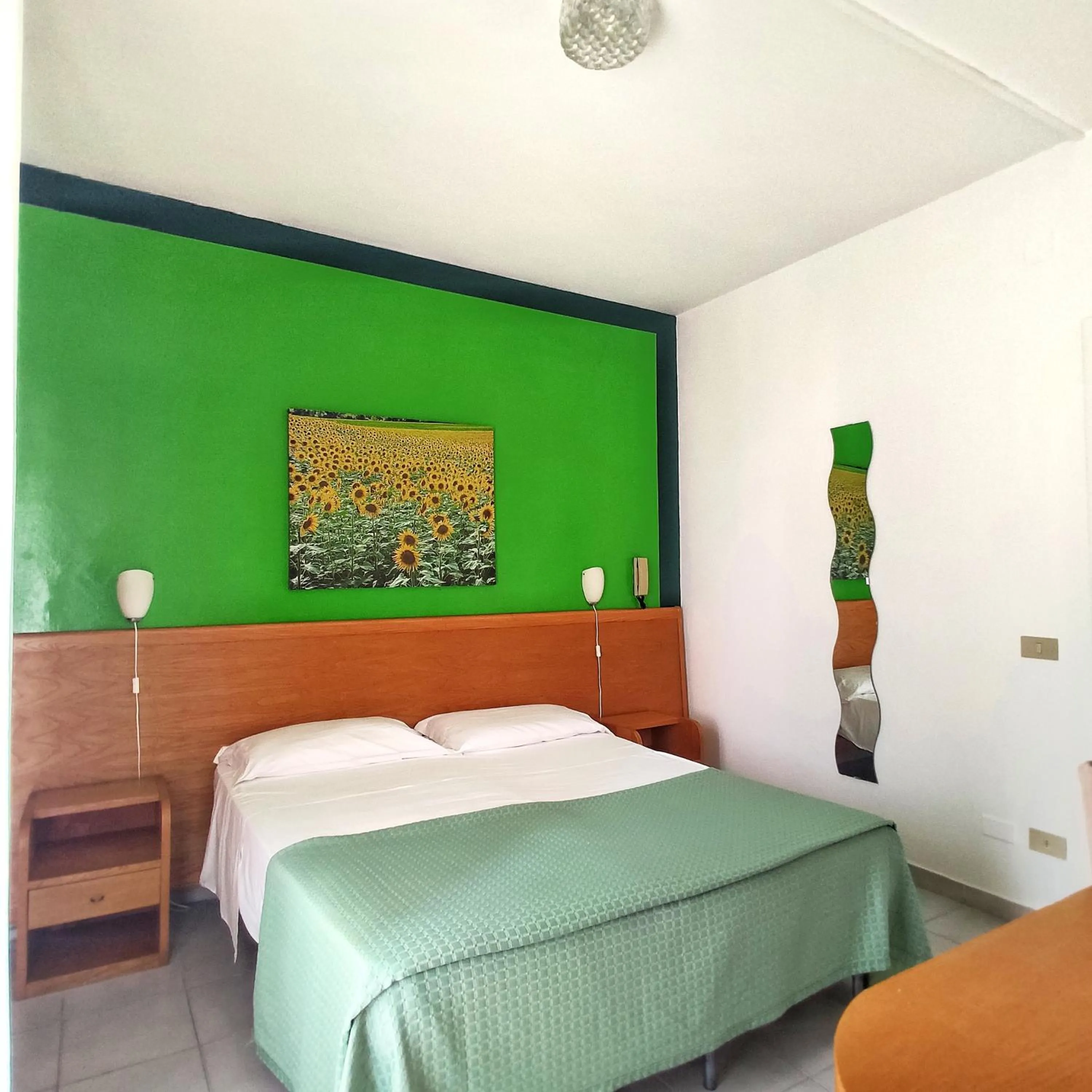 Bed in Piccolo Hotel