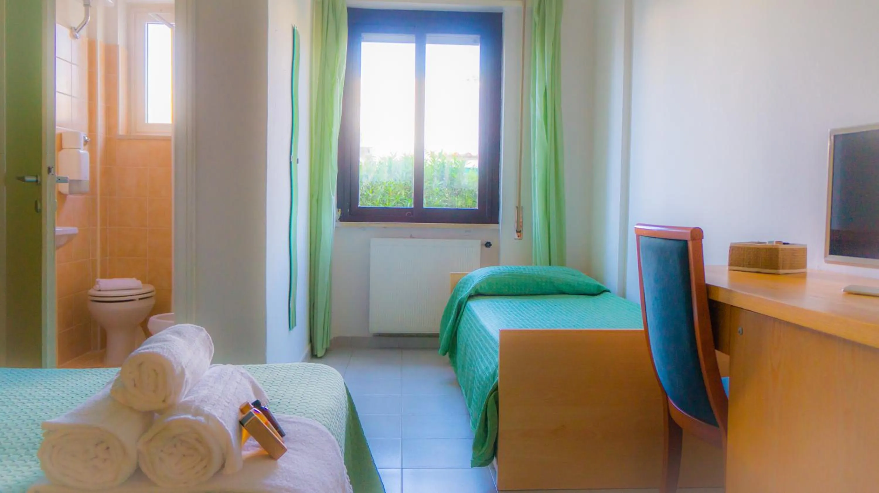 Bedroom in Piccolo Hotel