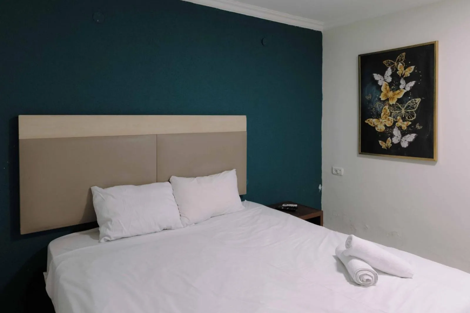 Bed in Rich Boutique Hotel