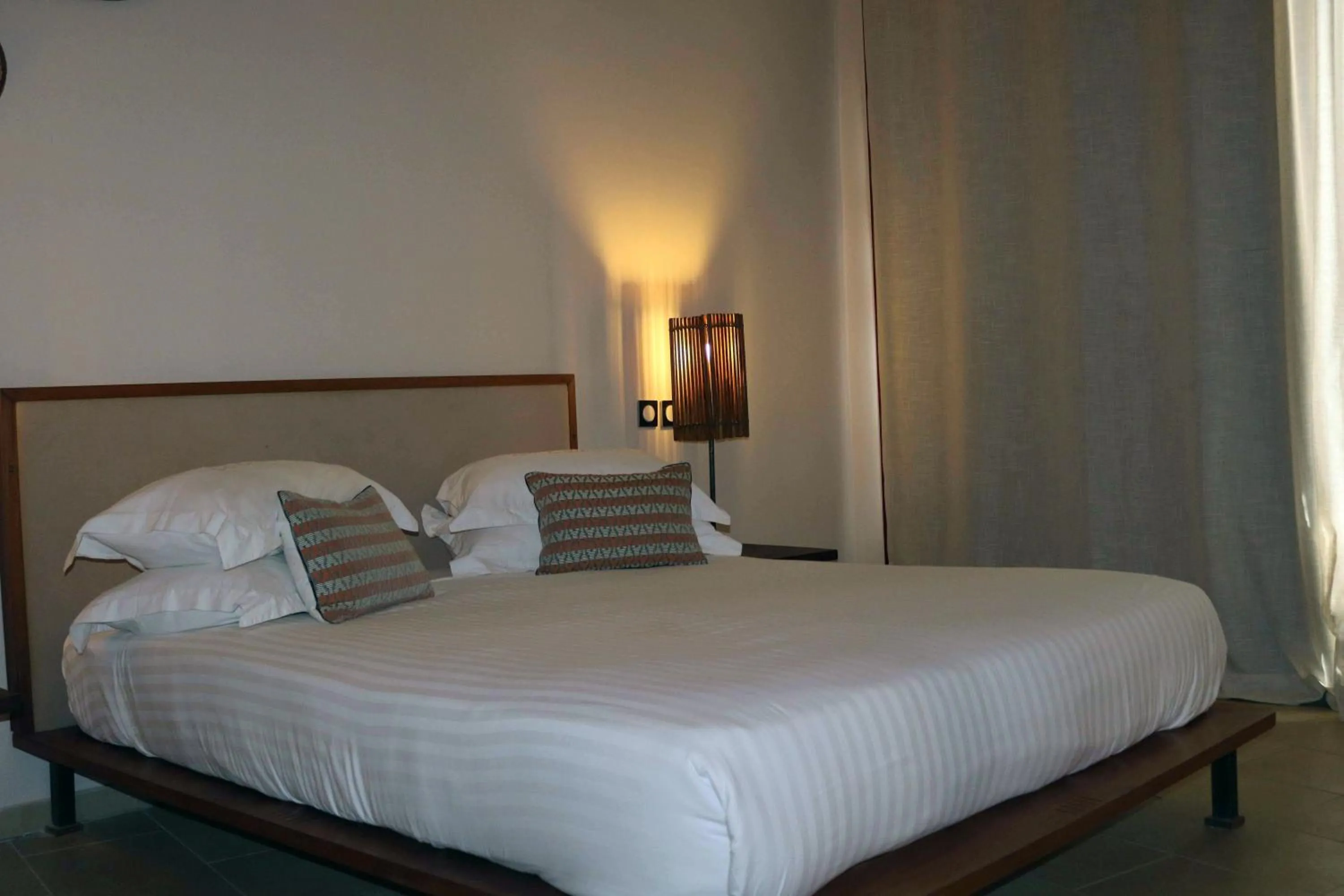 Photo of the whole room, Bed in Movenpick Resort Lamantin Saly