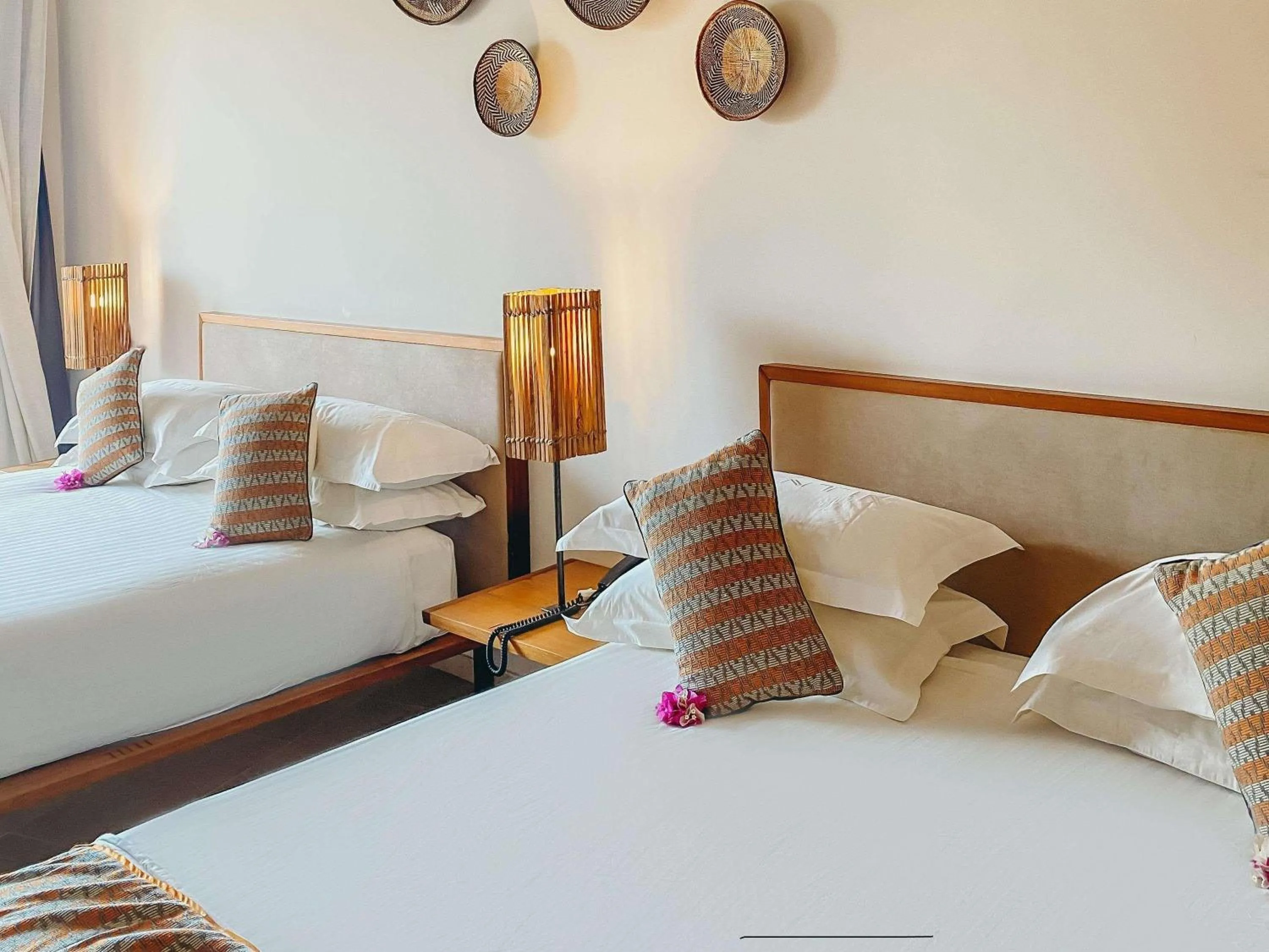 Photo of the whole room, Bed in Movenpick Resort Lamantin Saly