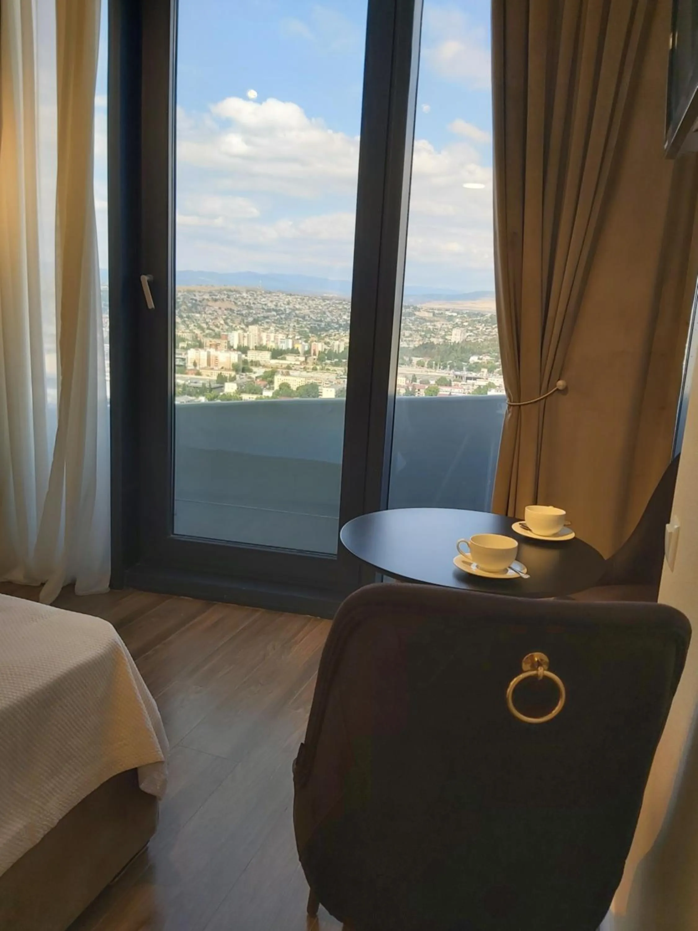 Seating area, Bed in King David Residence