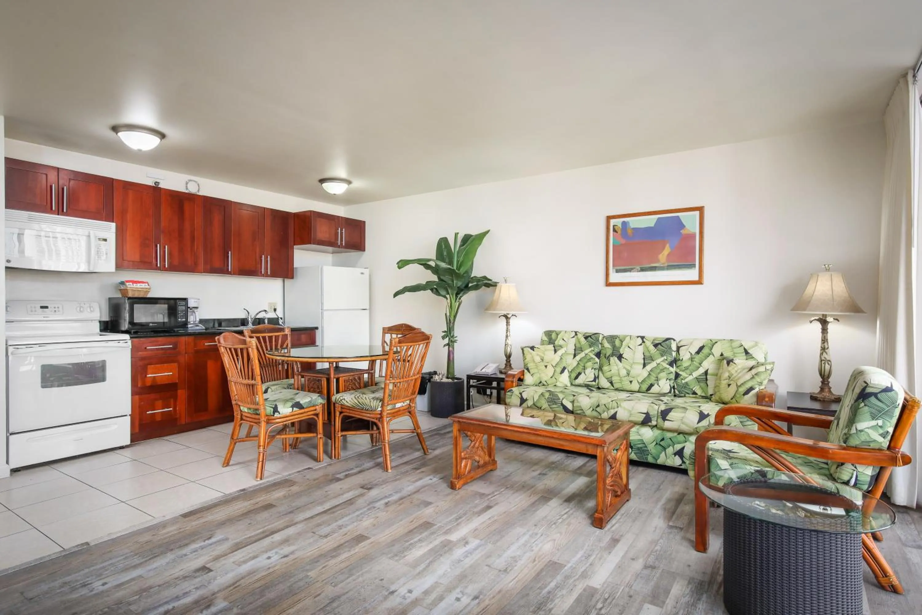 Kitchen or kitchenette in Aston at the Waikiki Banyan