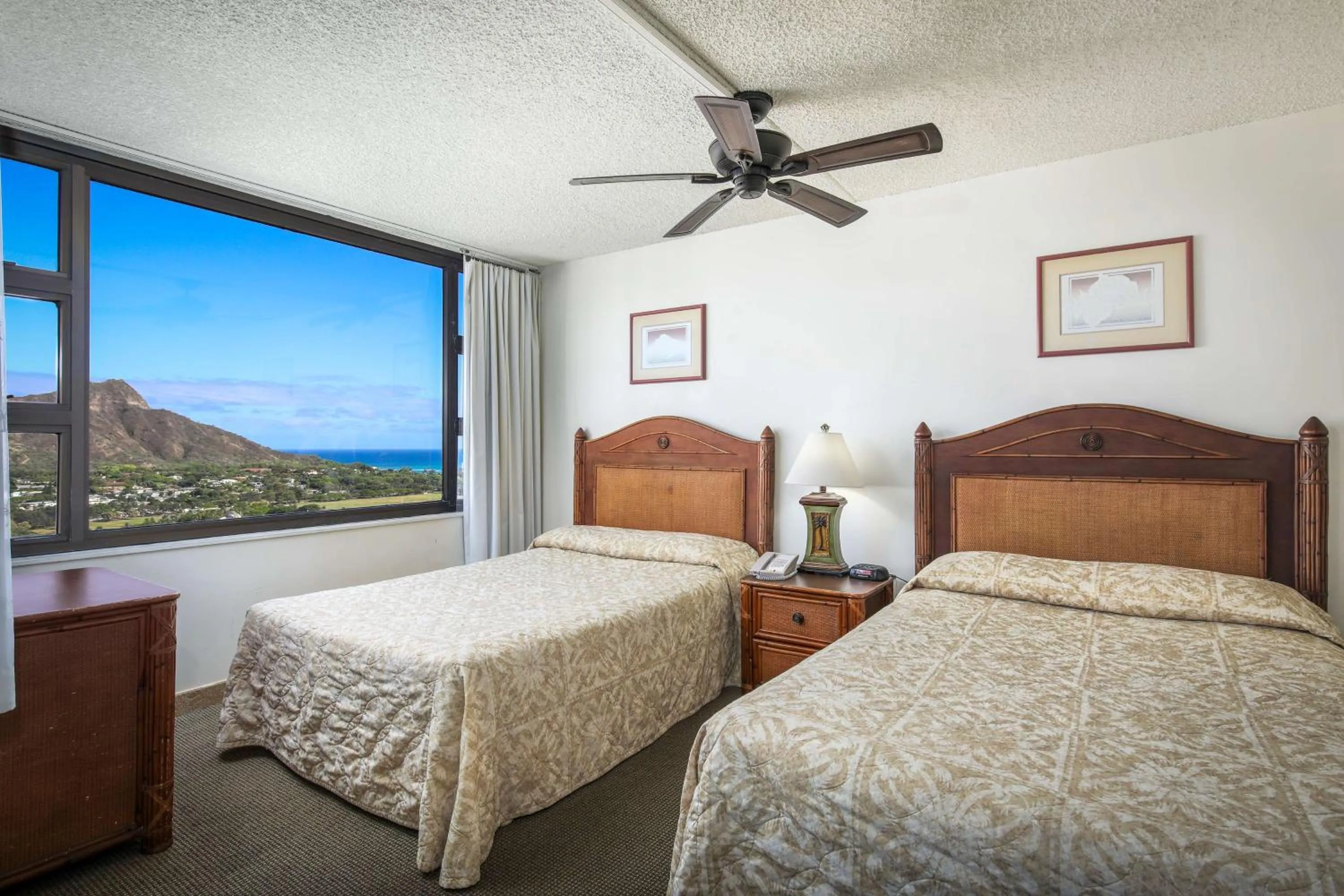 Bed in Aston at the Waikiki Banyan