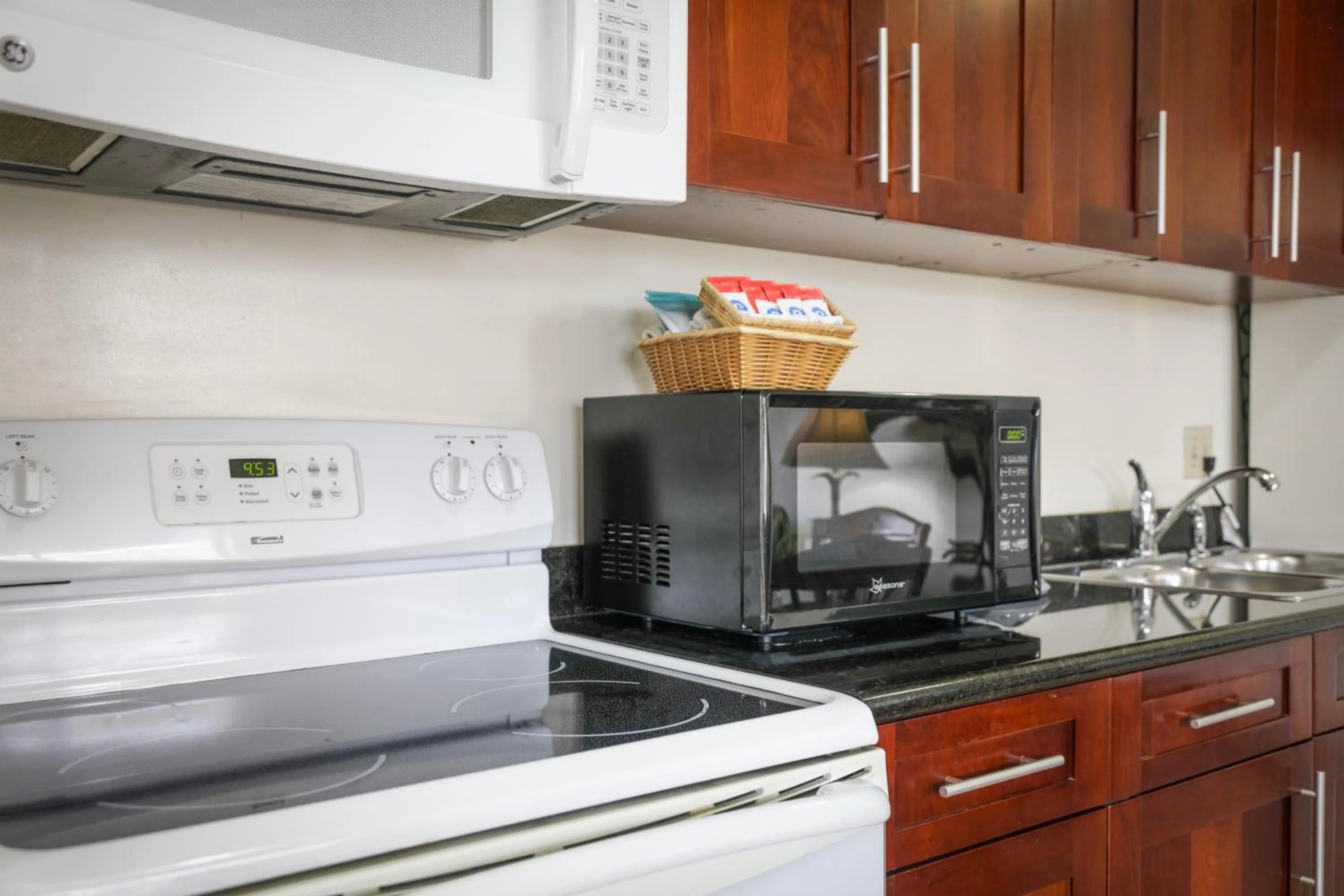 Kitchen or kitchenette in Aston at the Waikiki Banyan