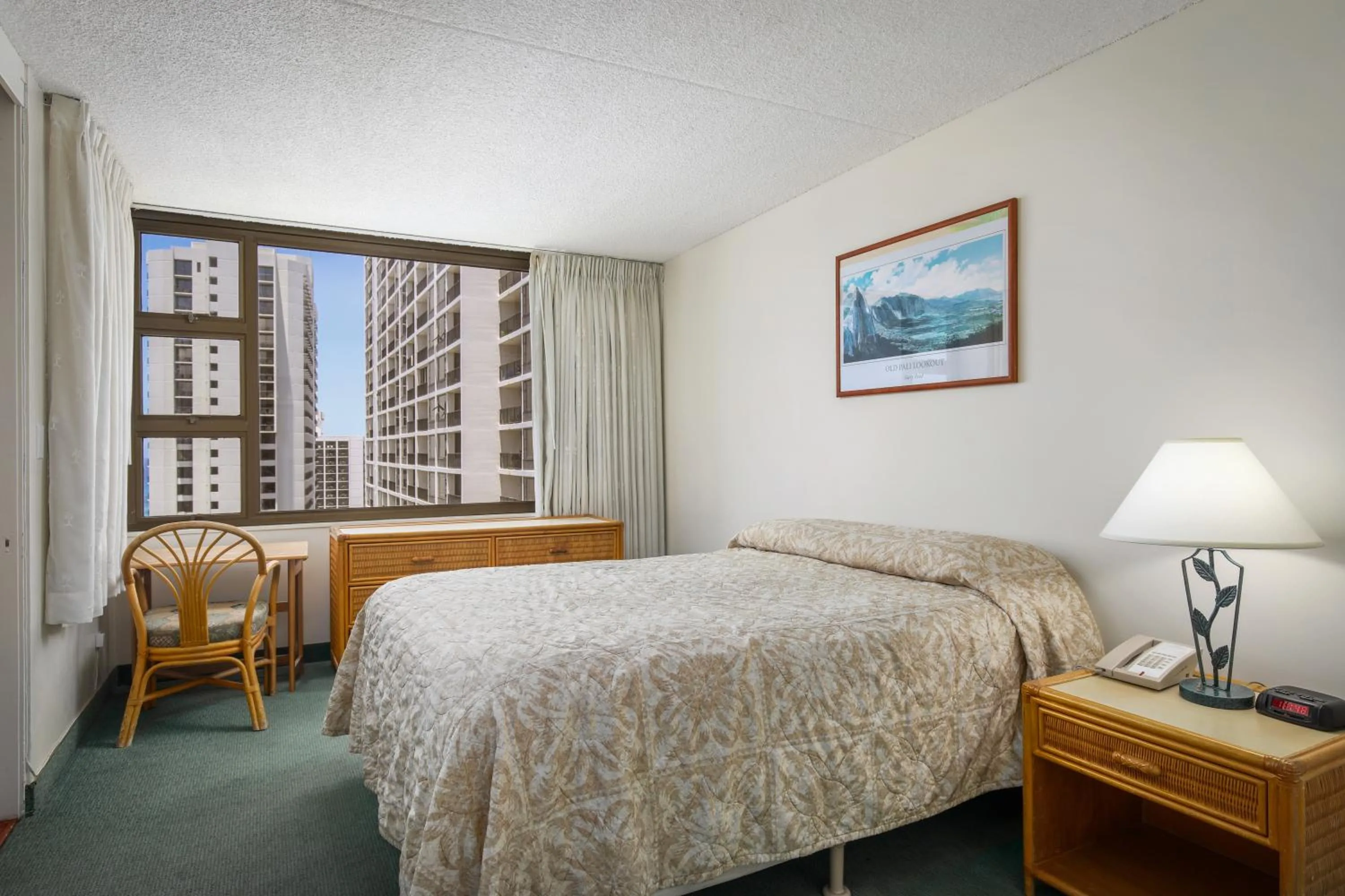 Bed in Aston at the Waikiki Banyan