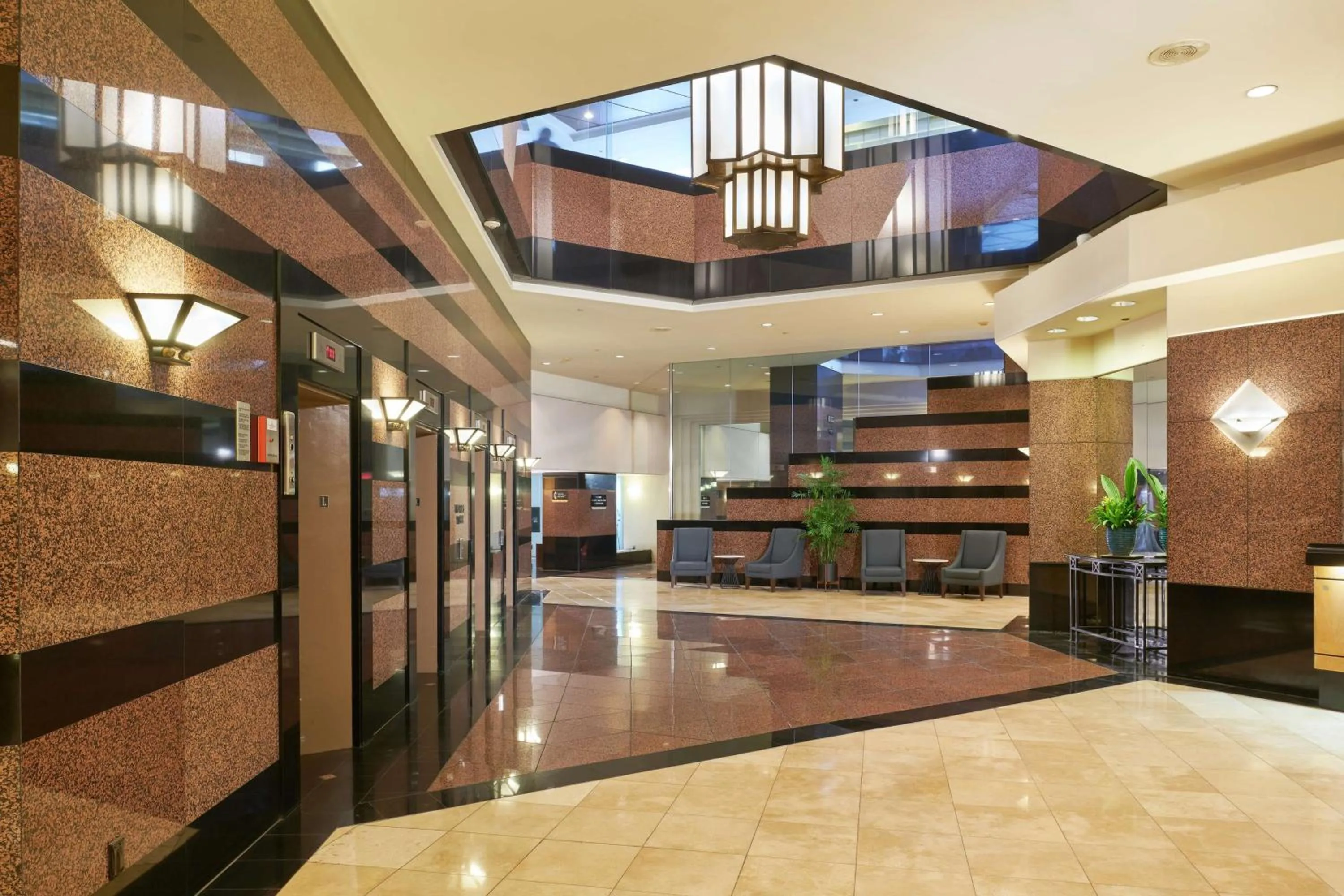 Lobby or reception in Aston at the Executive Centre Hotel