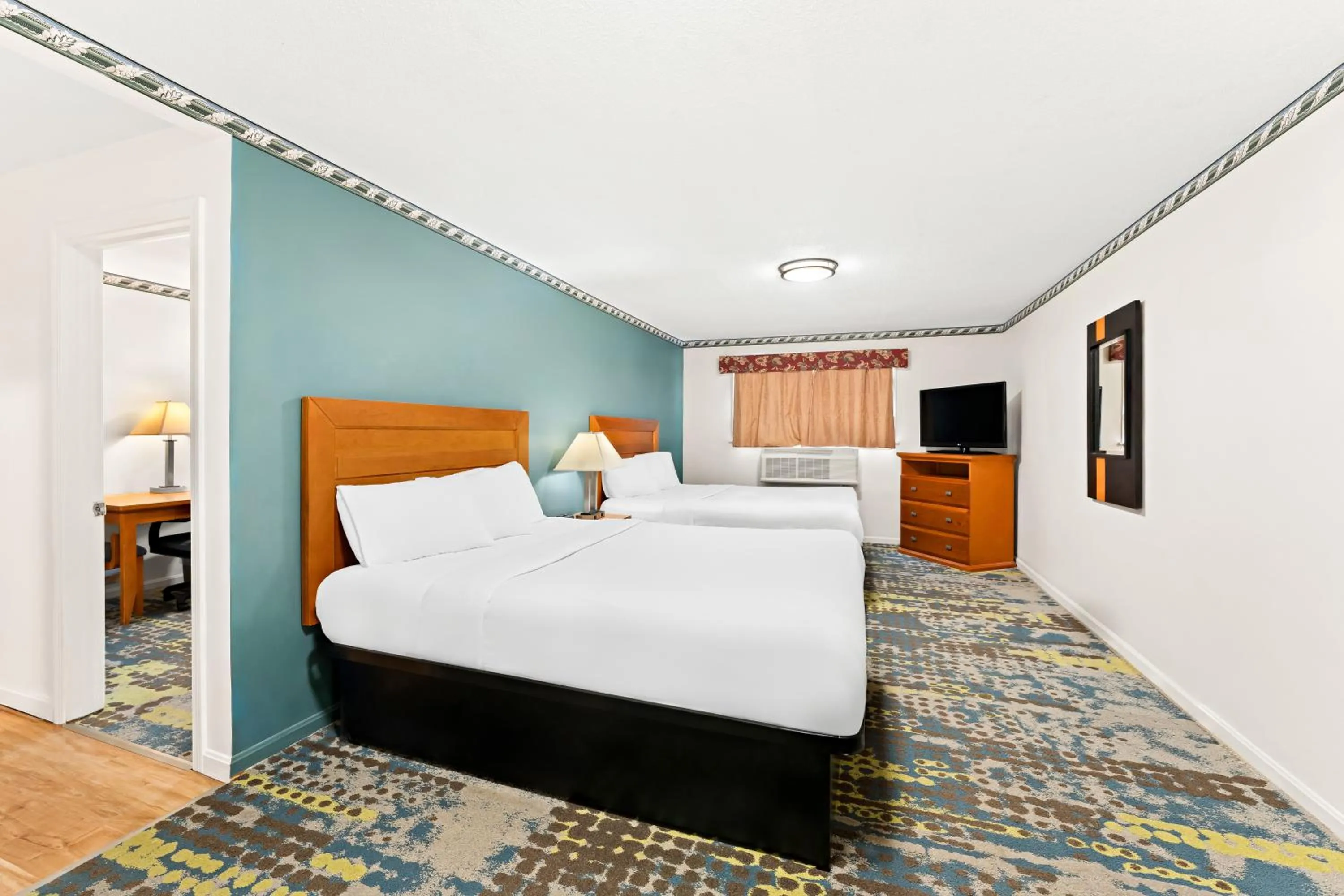 Bed in Americas Best Value Inn Stonington Mystic