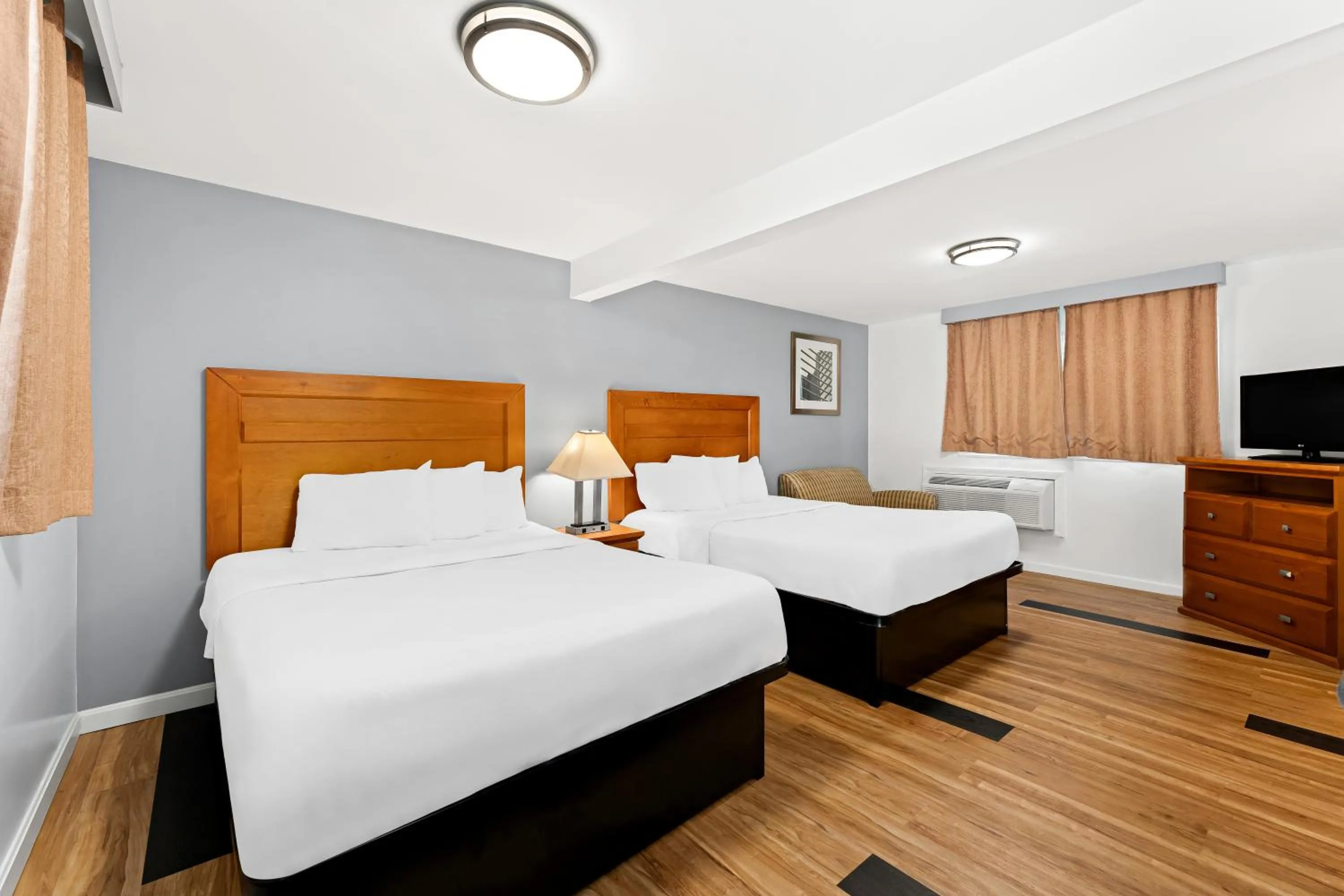 Bed in Americas Best Value Inn Stonington Mystic