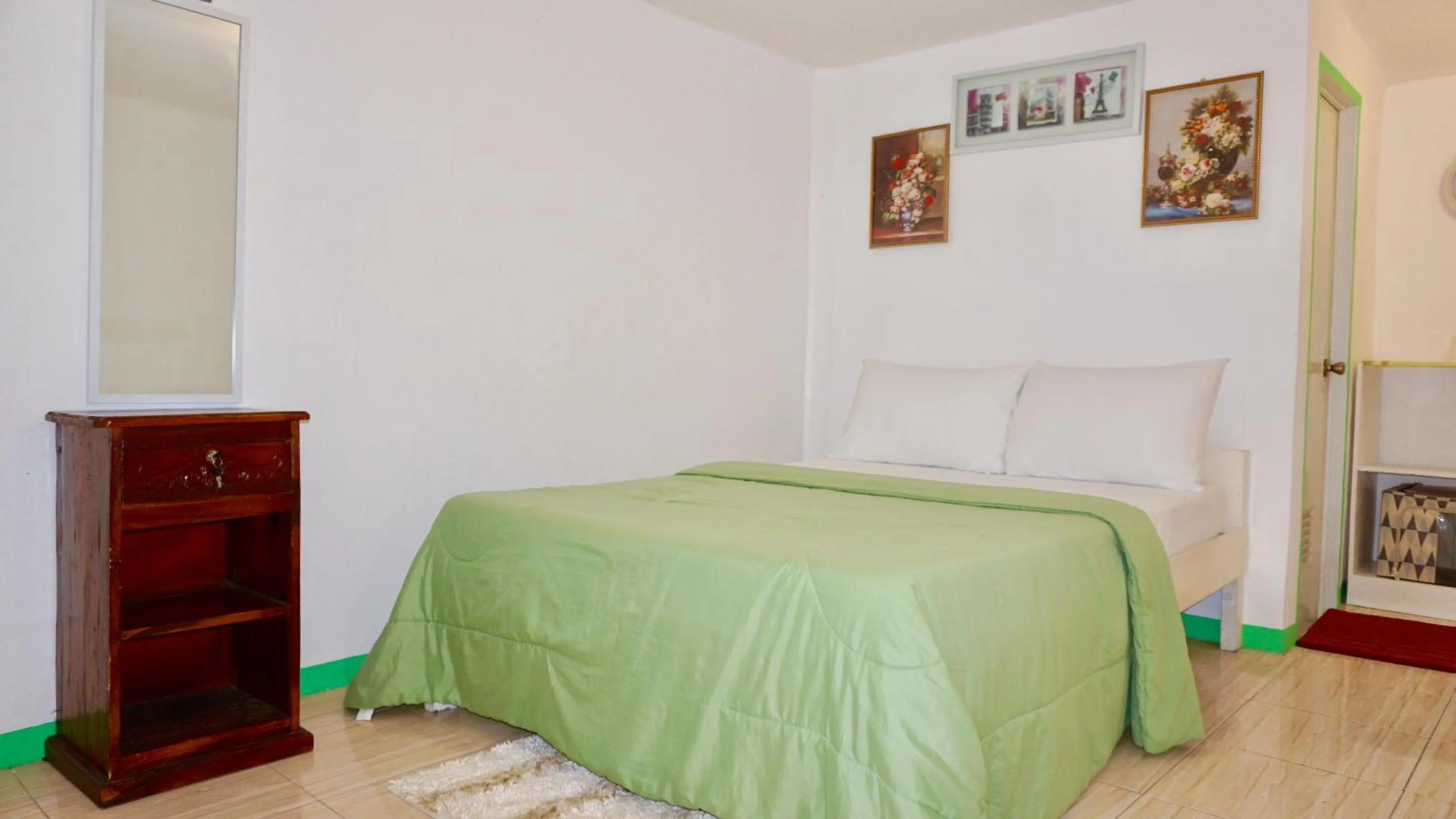 Bed in Mabuhay Thresher Dive Resort