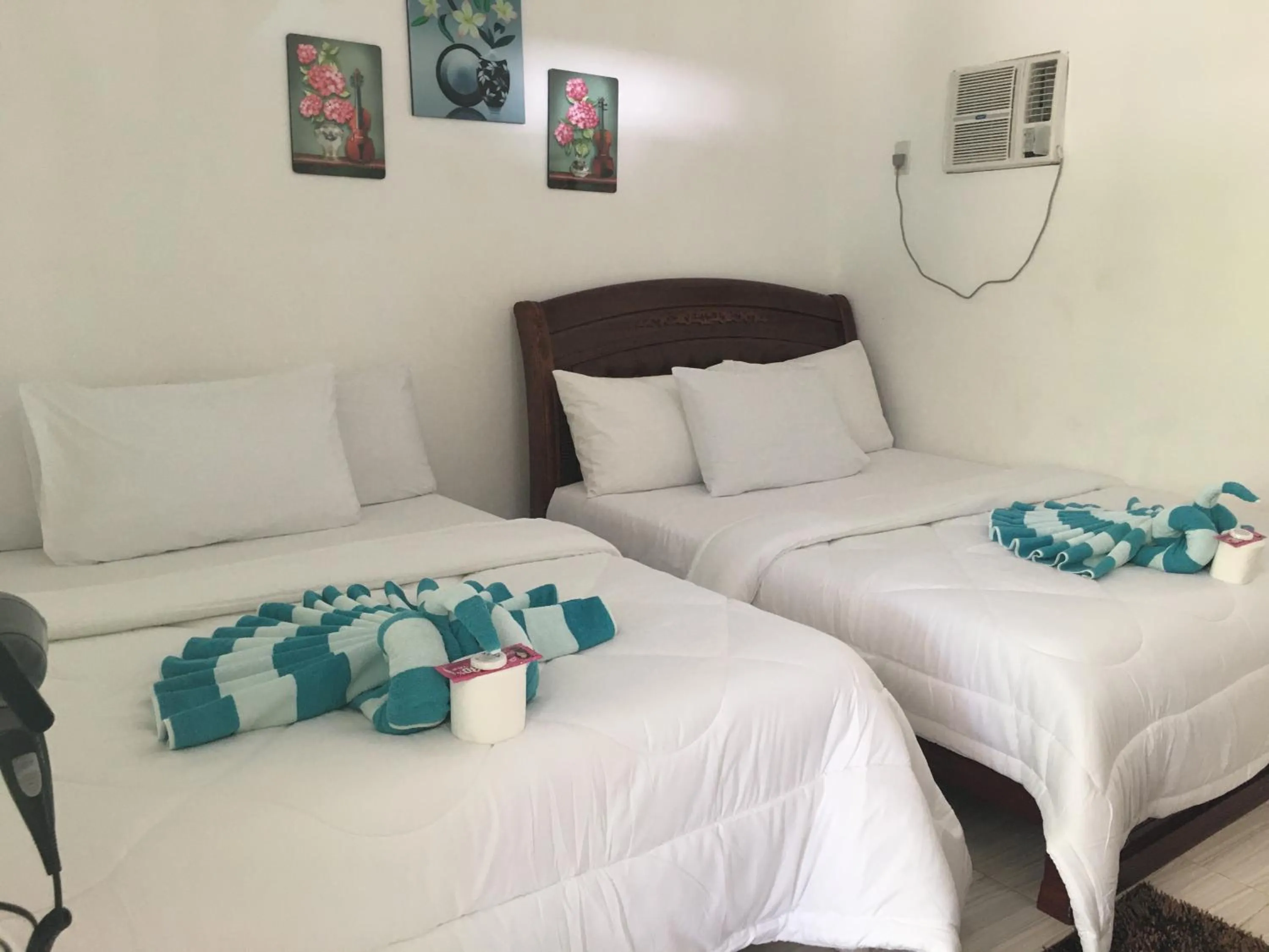 Bed in Mabuhay Thresher Dive Resort