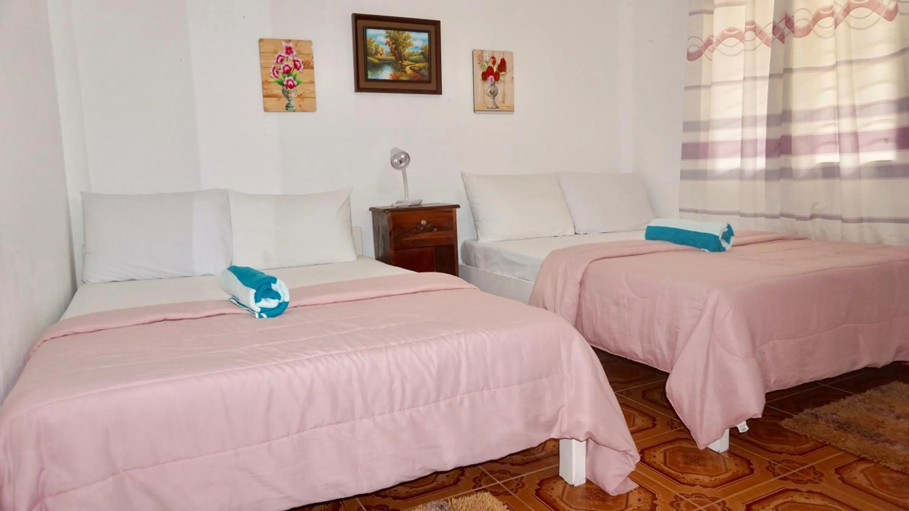 Bed in Mabuhay Thresher Dive Resort