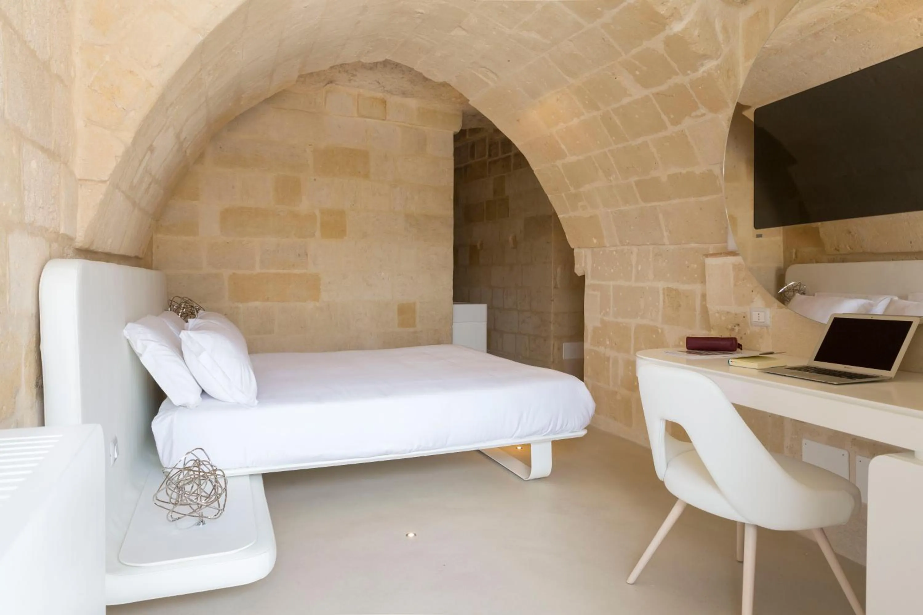 Bed in Aquatio Cave Luxury Hotel & SPA