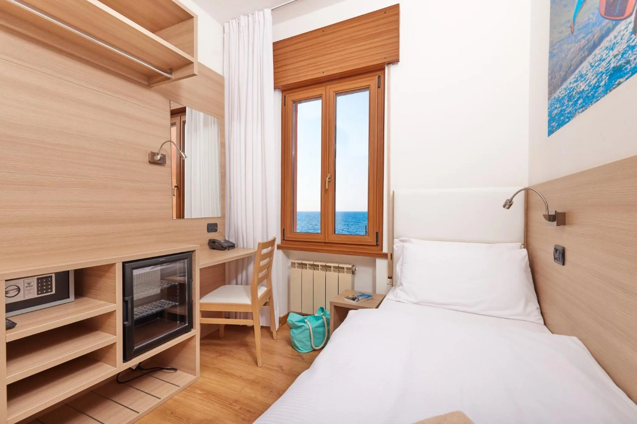 Bedroom in Beach Hotel Rosa