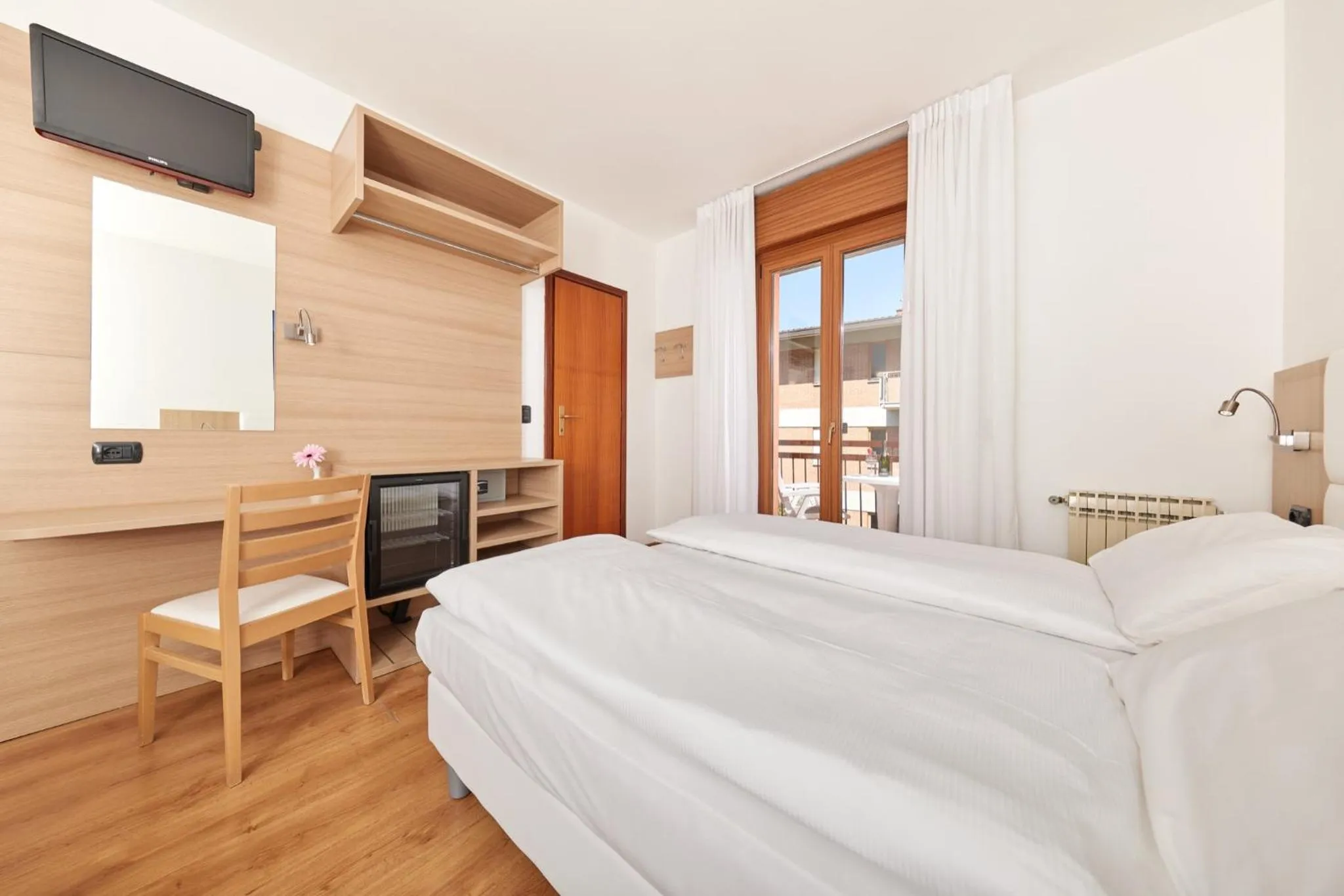 Bedroom in Beach Hotel Rosa