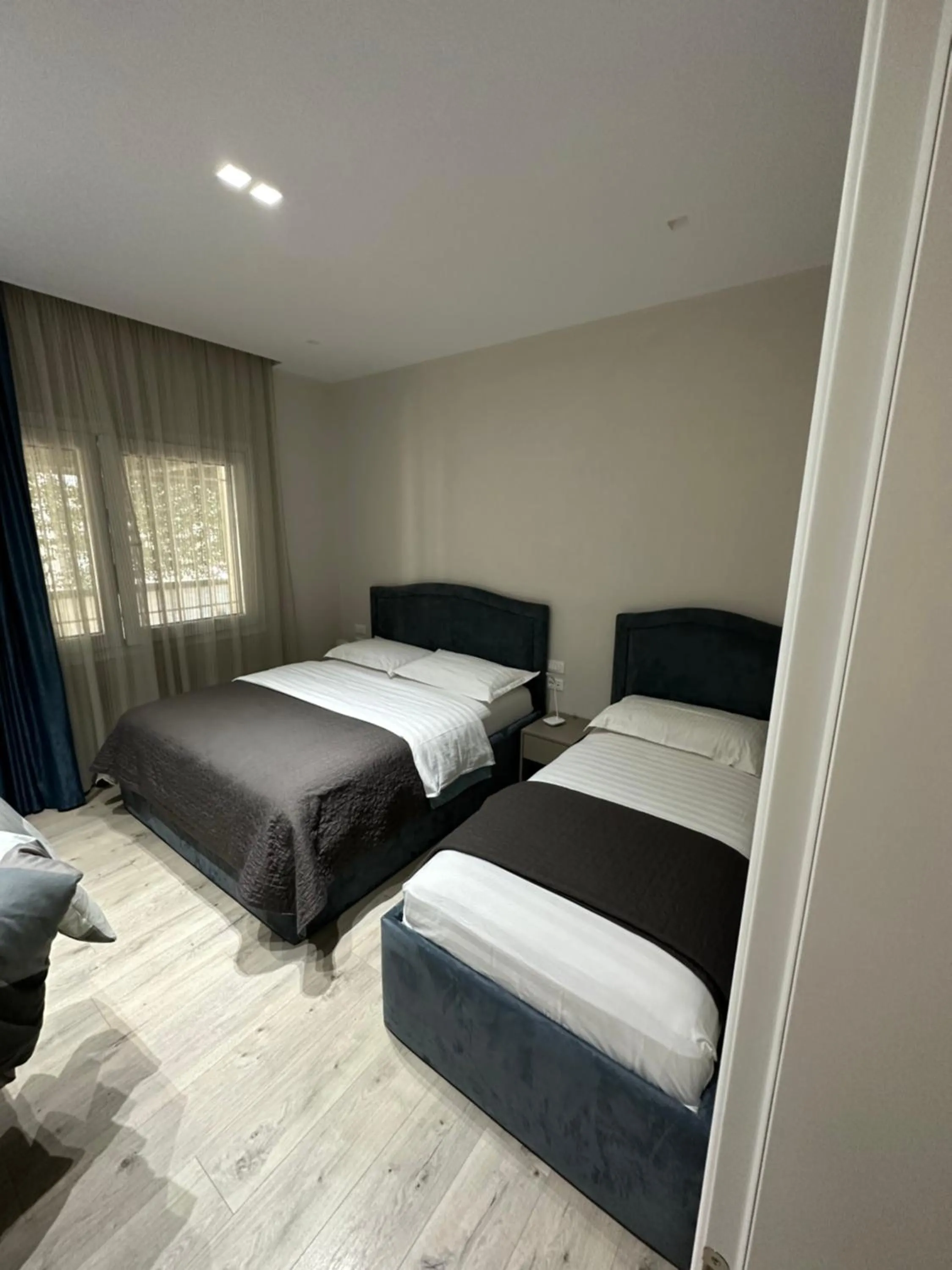 Bed in Brilant Apartament