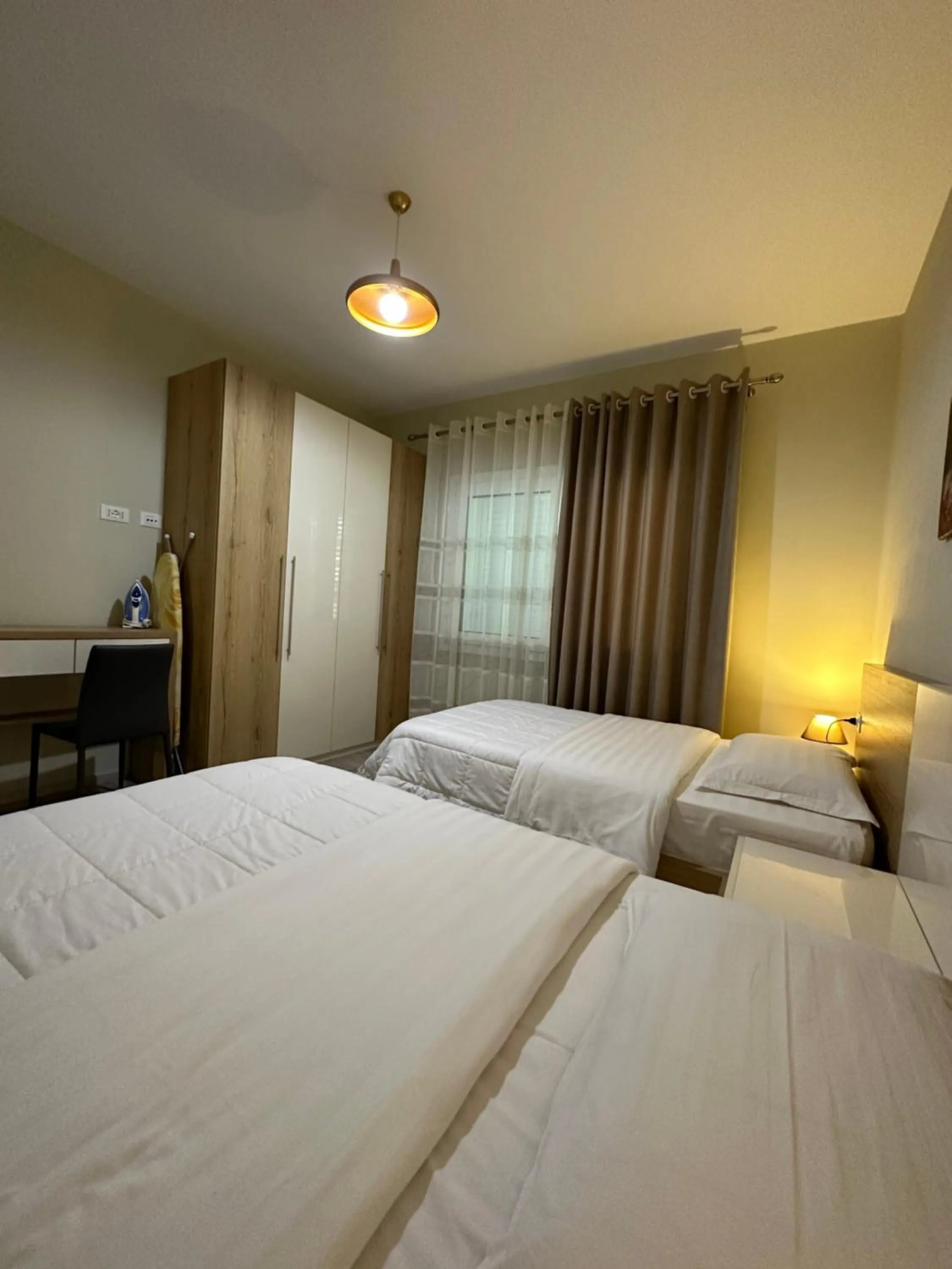 Bed in Brilant Apartament