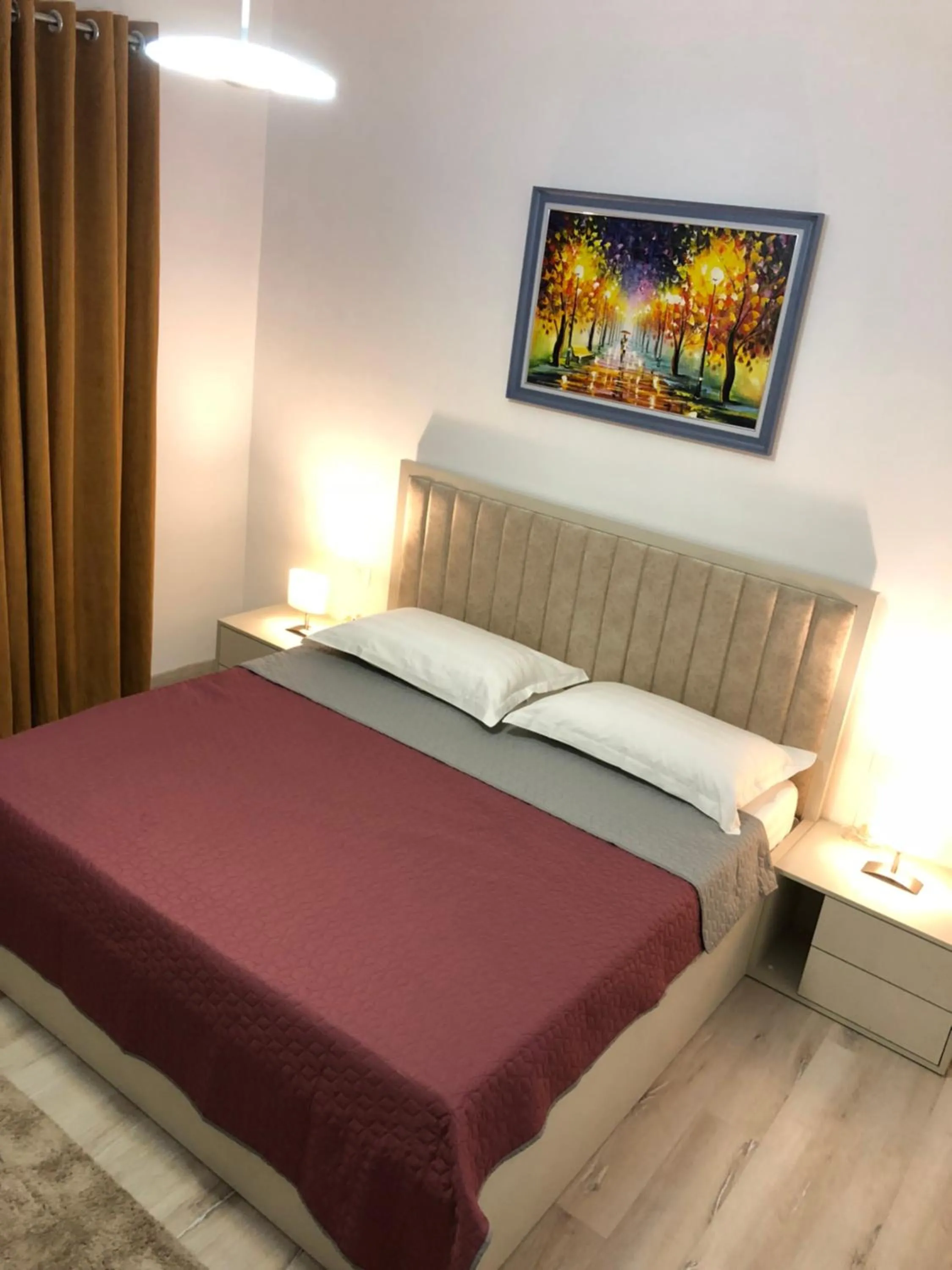 Bed in Brilant Apartament