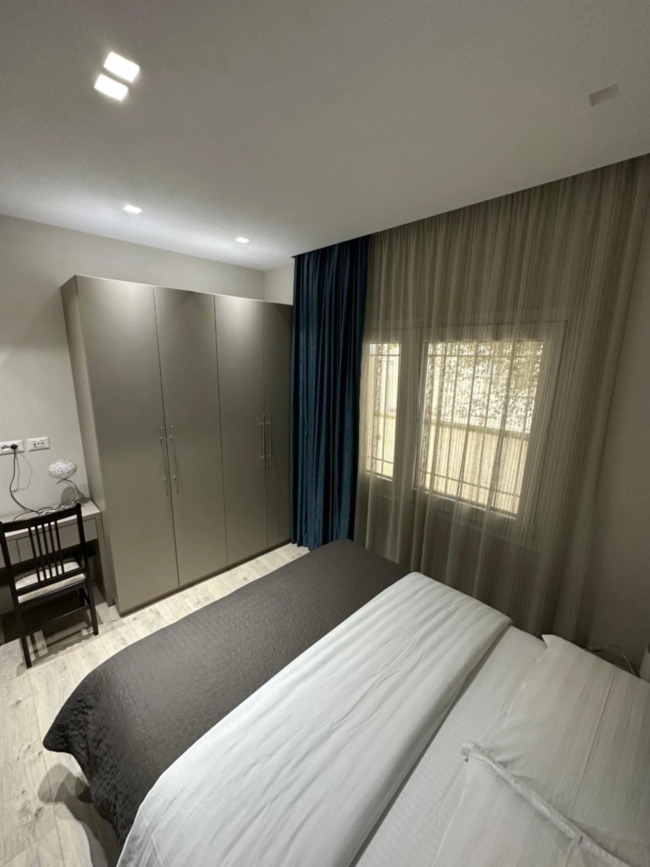 Bed in Brilant Apartament