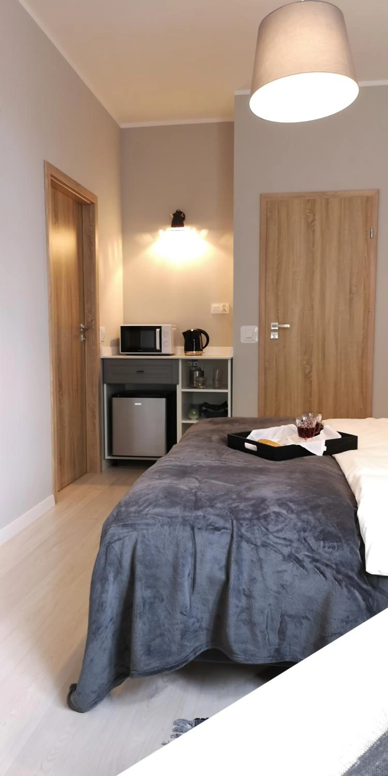 Bed in Glam House Apartments