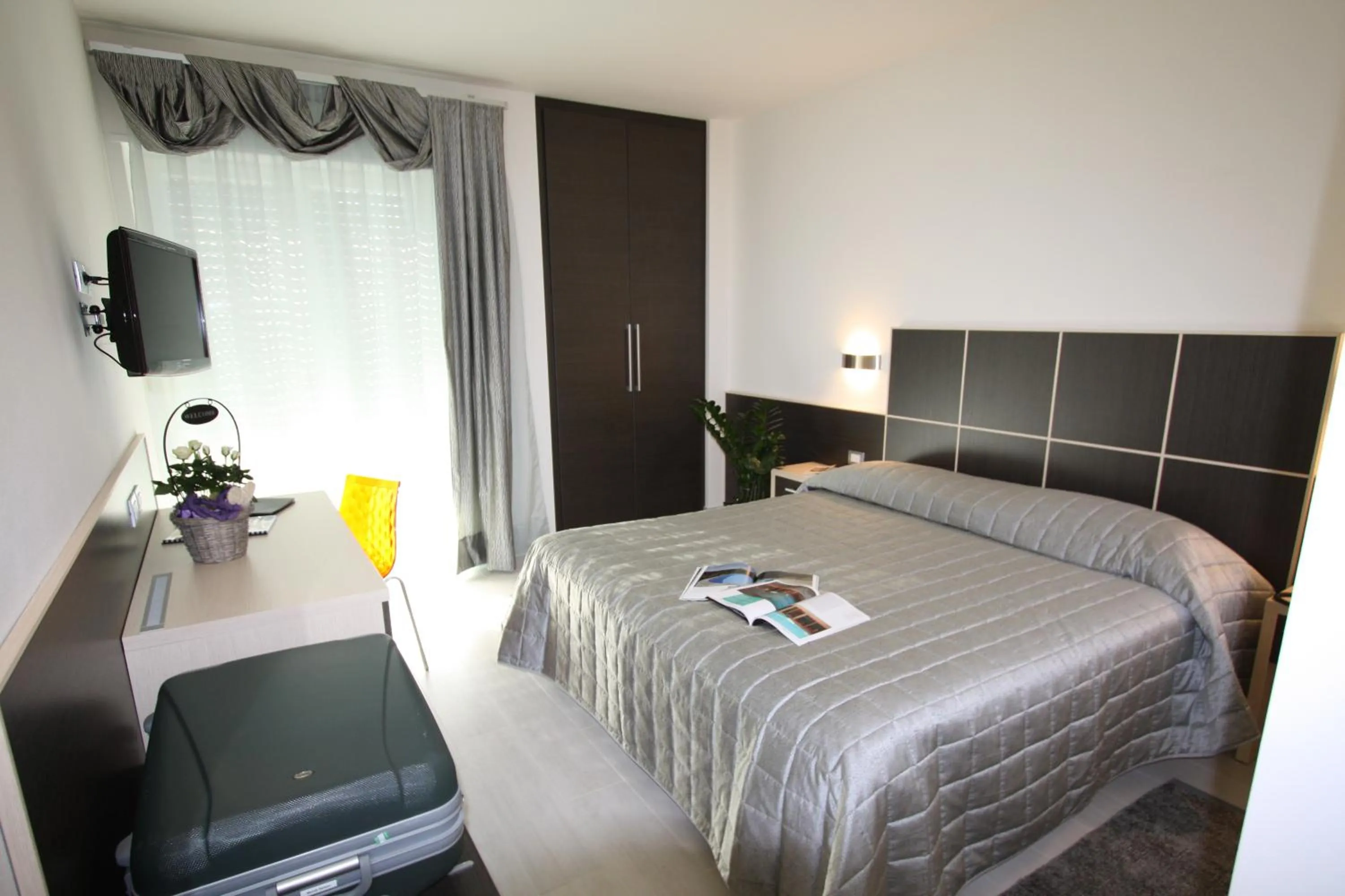 Photo of the whole room, Bed in Hotel Garnì Corallo