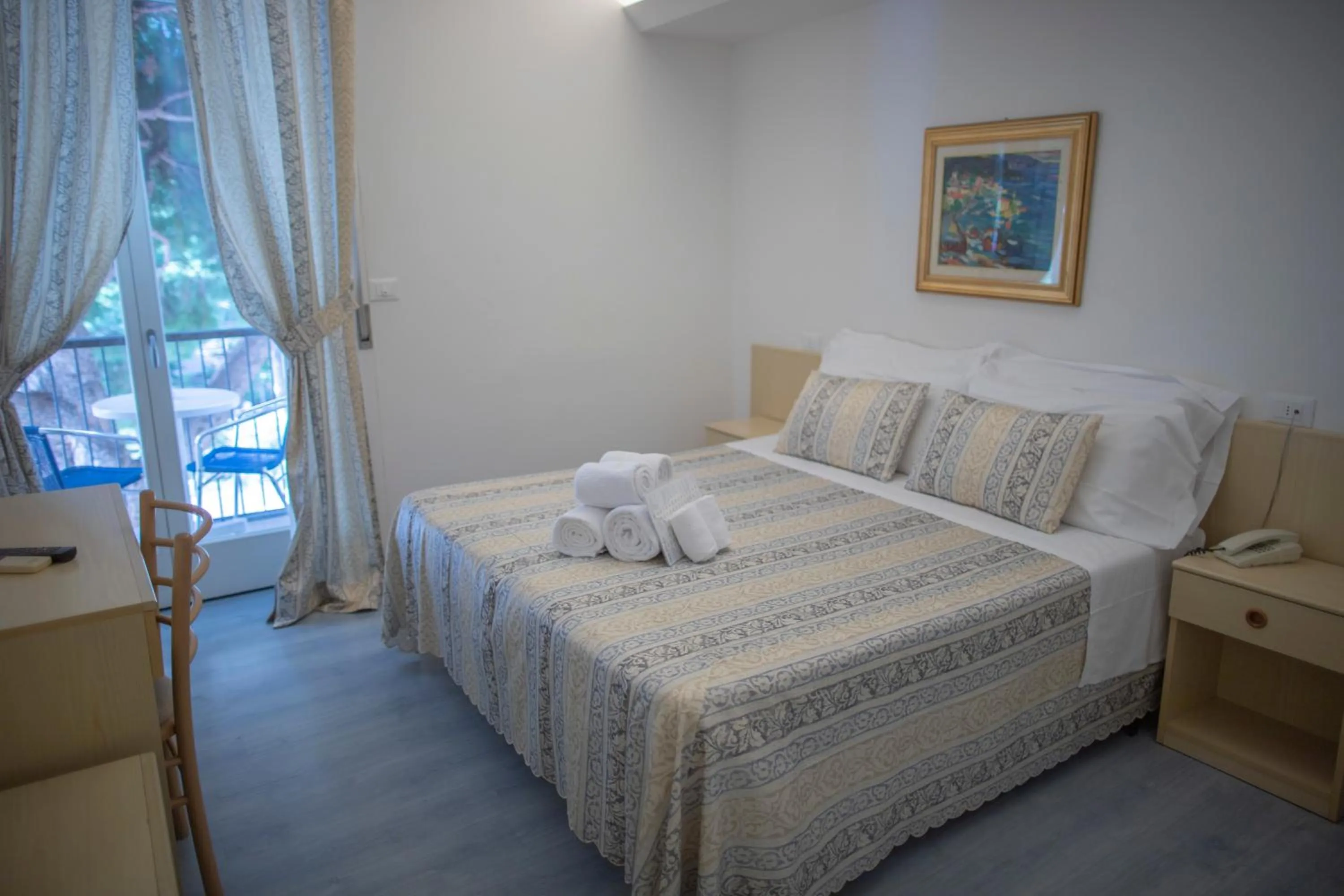 Bed in Hotel Ligure
