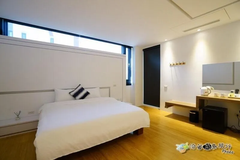 Bed in CHEN FENG HOMESTAY