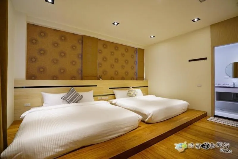 Bed in CHEN FENG HOMESTAY