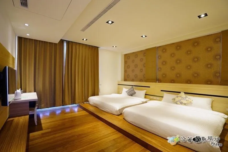 Bed in CHEN FENG HOMESTAY