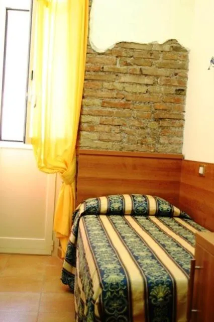 Bed in Hotel Bolognese