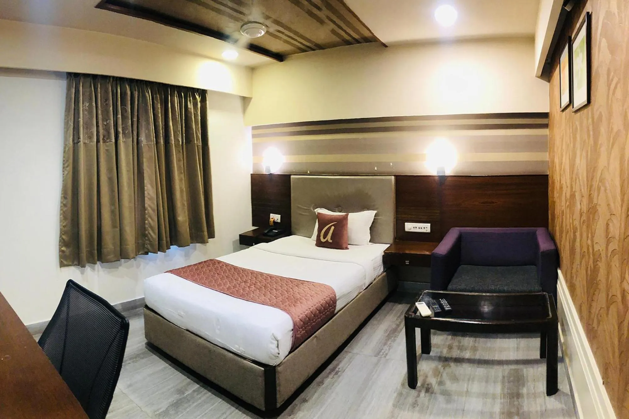 Bed in FabHotel Berry's