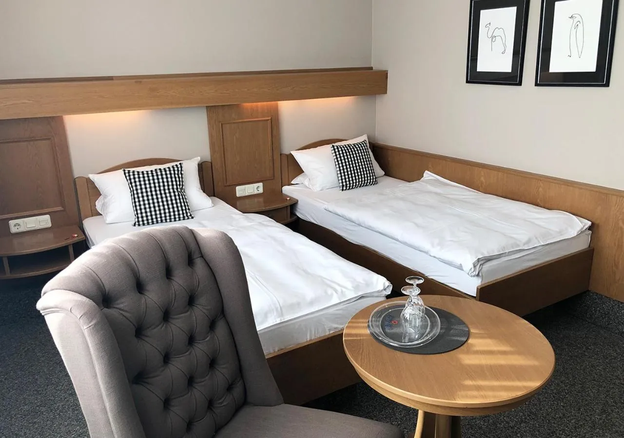 Bed in Mangolds Boutique Hotel & Fruehstuecksmeisterei