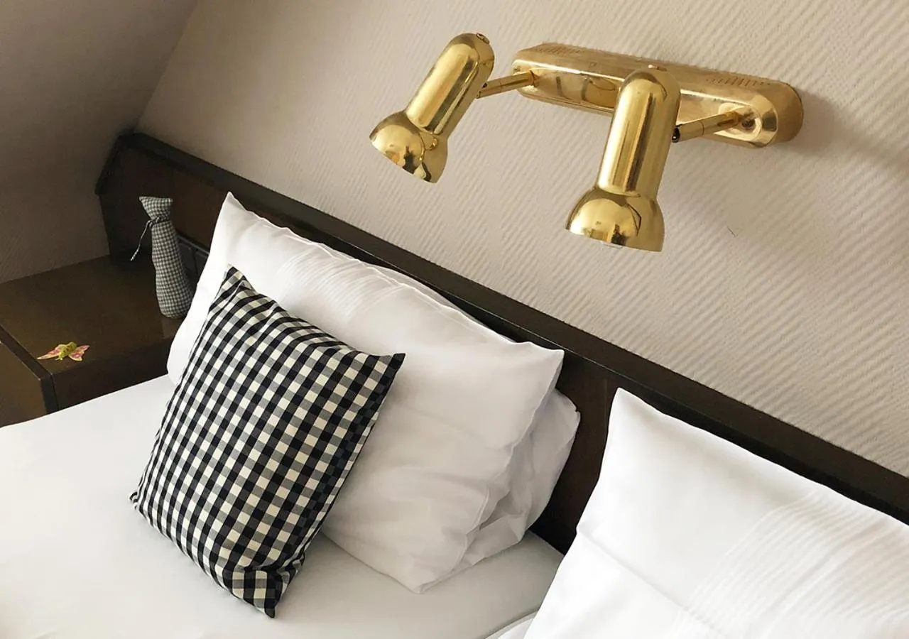 Bed in Mangolds Boutique Hotel & Fruehstuecksmeisterei