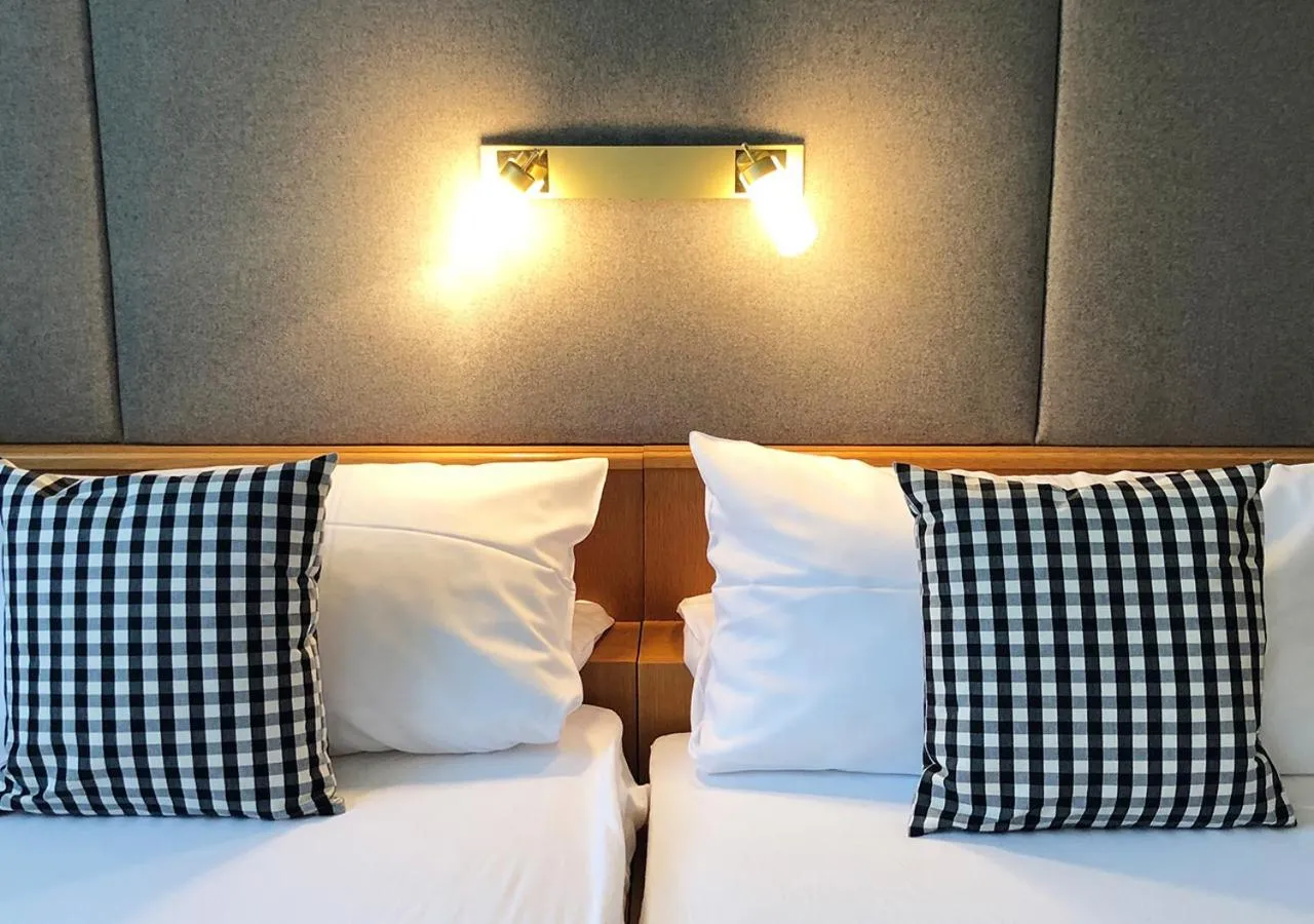 Bed in Mangolds Boutique Hotel & Fruehstuecksmeisterei