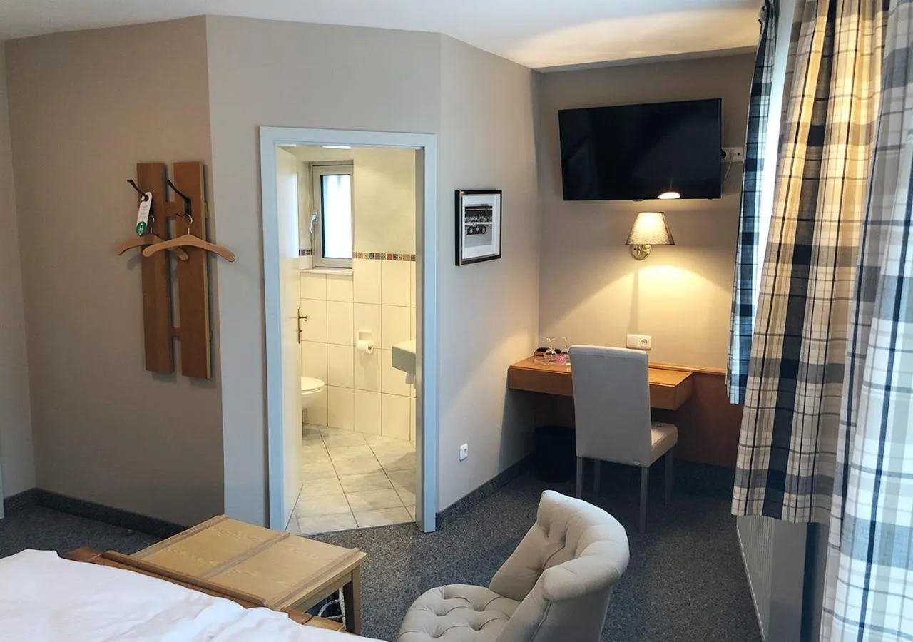 Bed in Mangolds Boutique Hotel & Fruehstuecksmeisterei