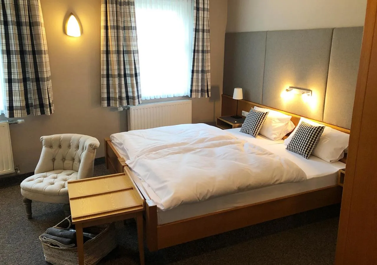Bed in Mangolds Boutique Hotel & Fruehstuecksmeisterei