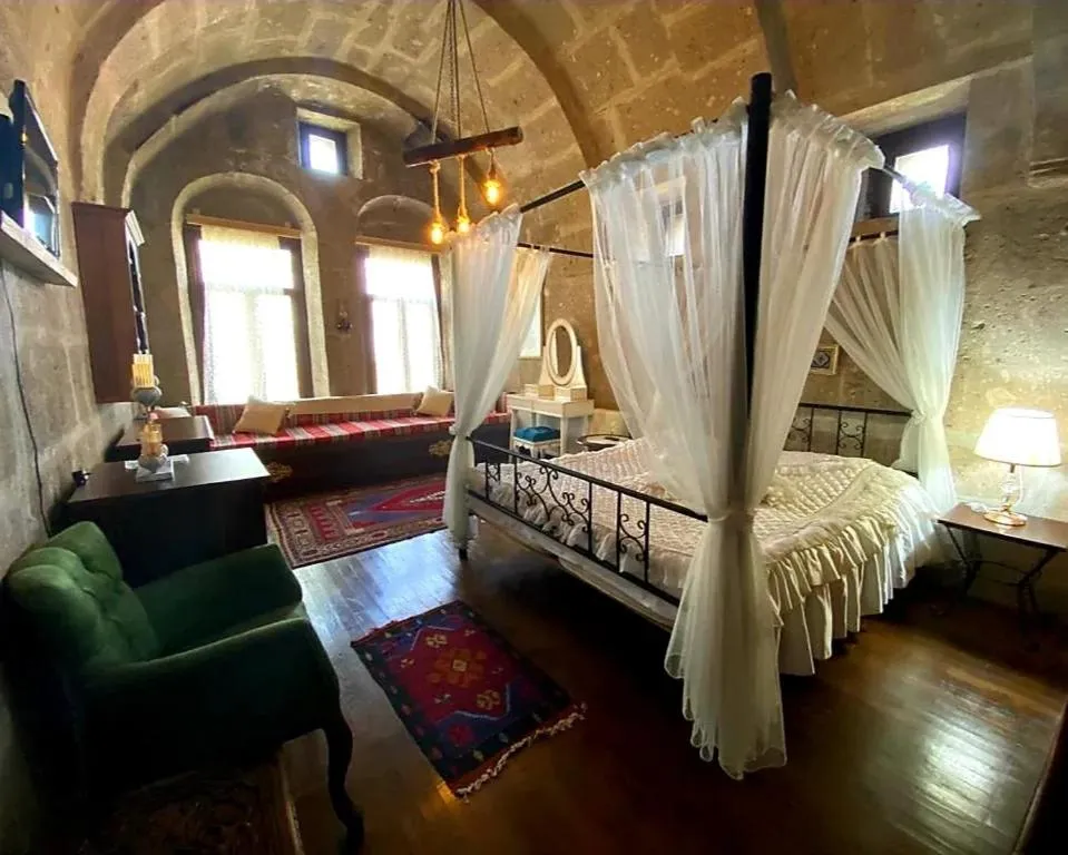 Photo of the whole room, Bed in Kapadokya Ihlara Konaklari & Caves
