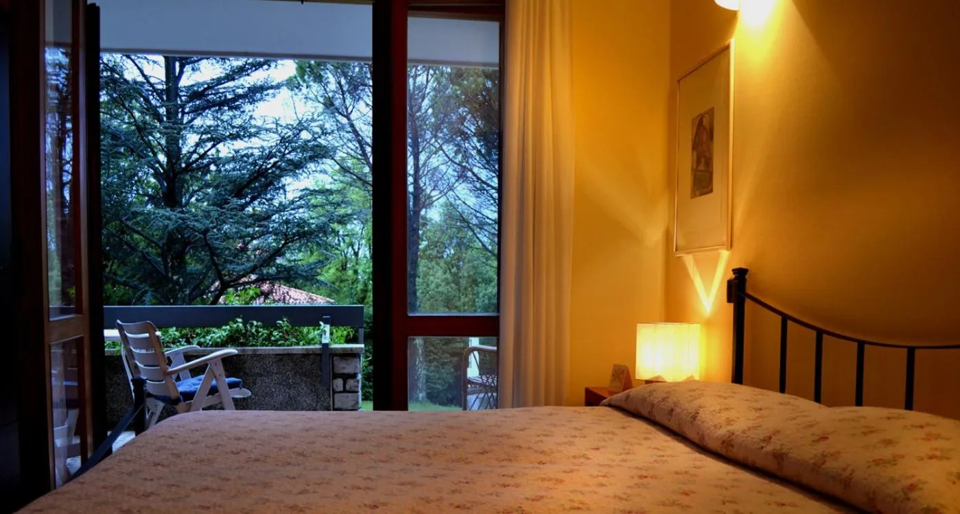 Photo of the whole room, Bed in Villa Rilke Duino