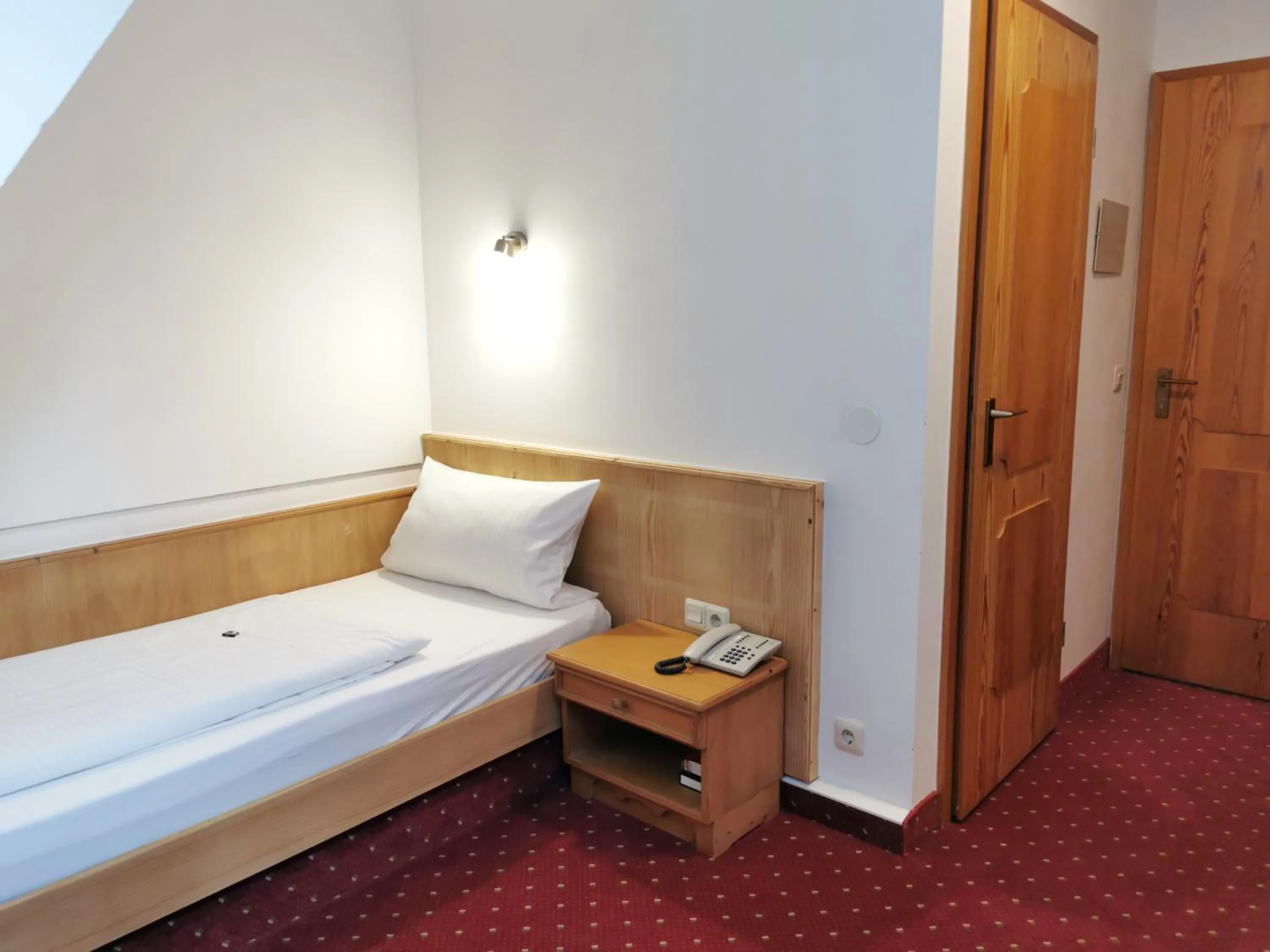 Photo of the whole room, Bed in Landhotel Ölmühle
