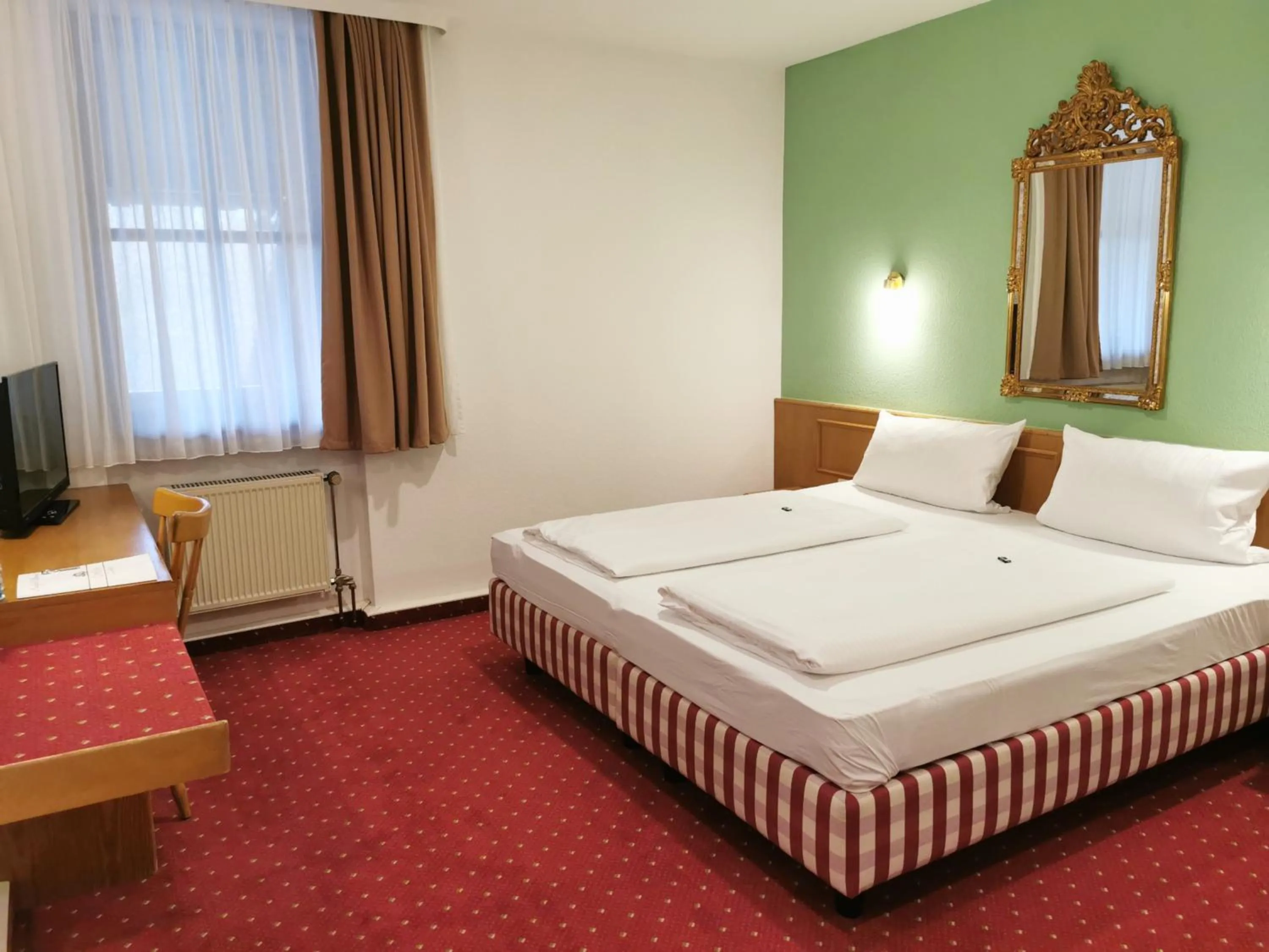 Photo of the whole room, Bed in Landhotel Ölmühle