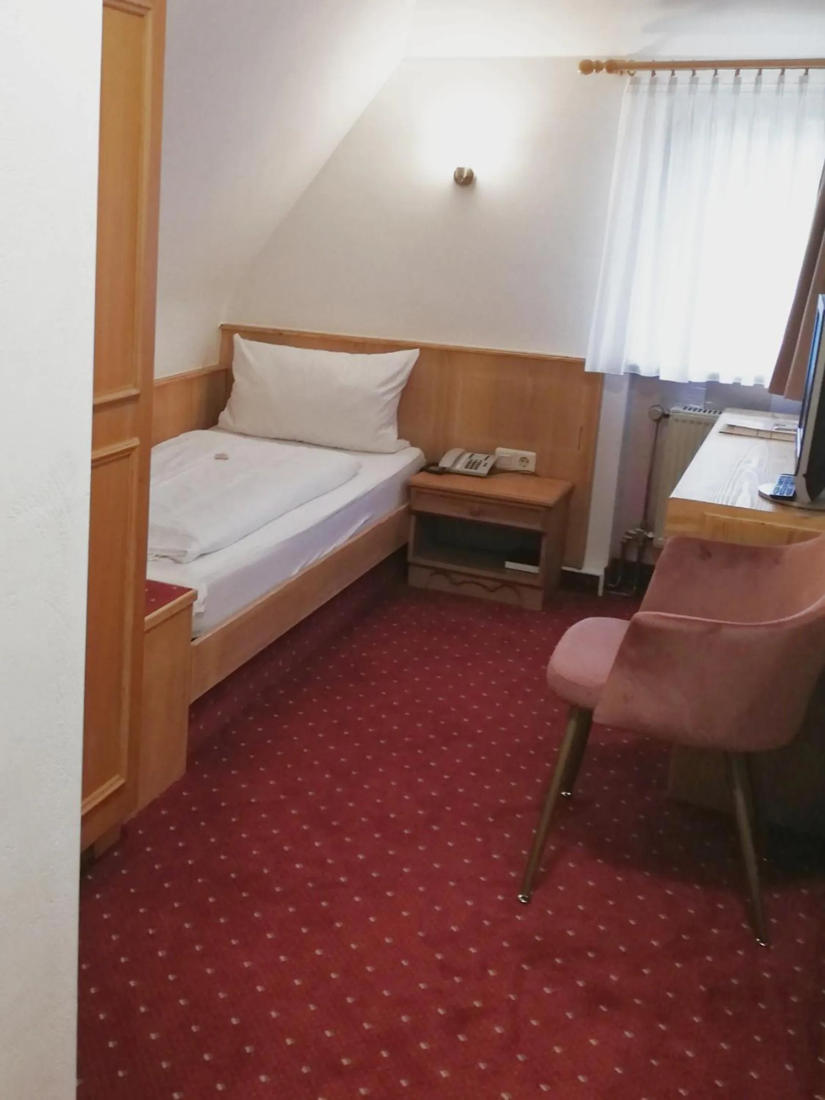 Photo of the whole room, Bed in Landhotel Ölmühle