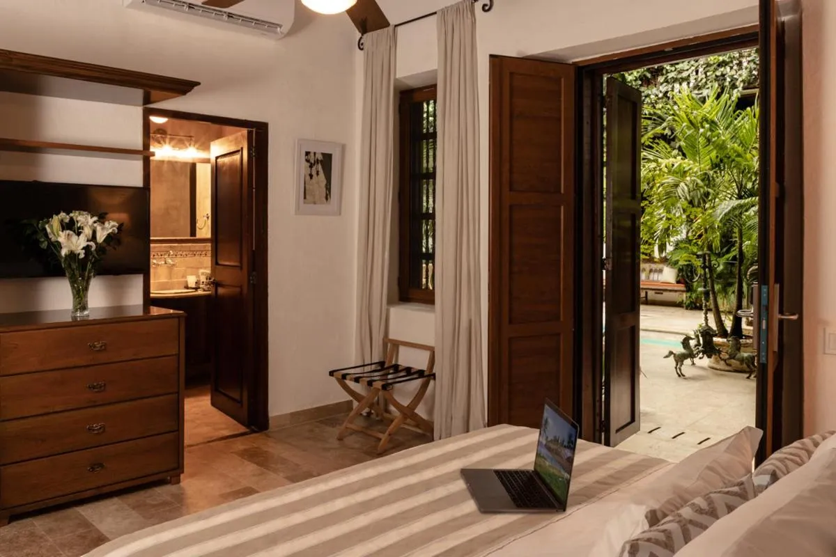 Bedroom in Hotel Boutique Casa Del Arzobispado