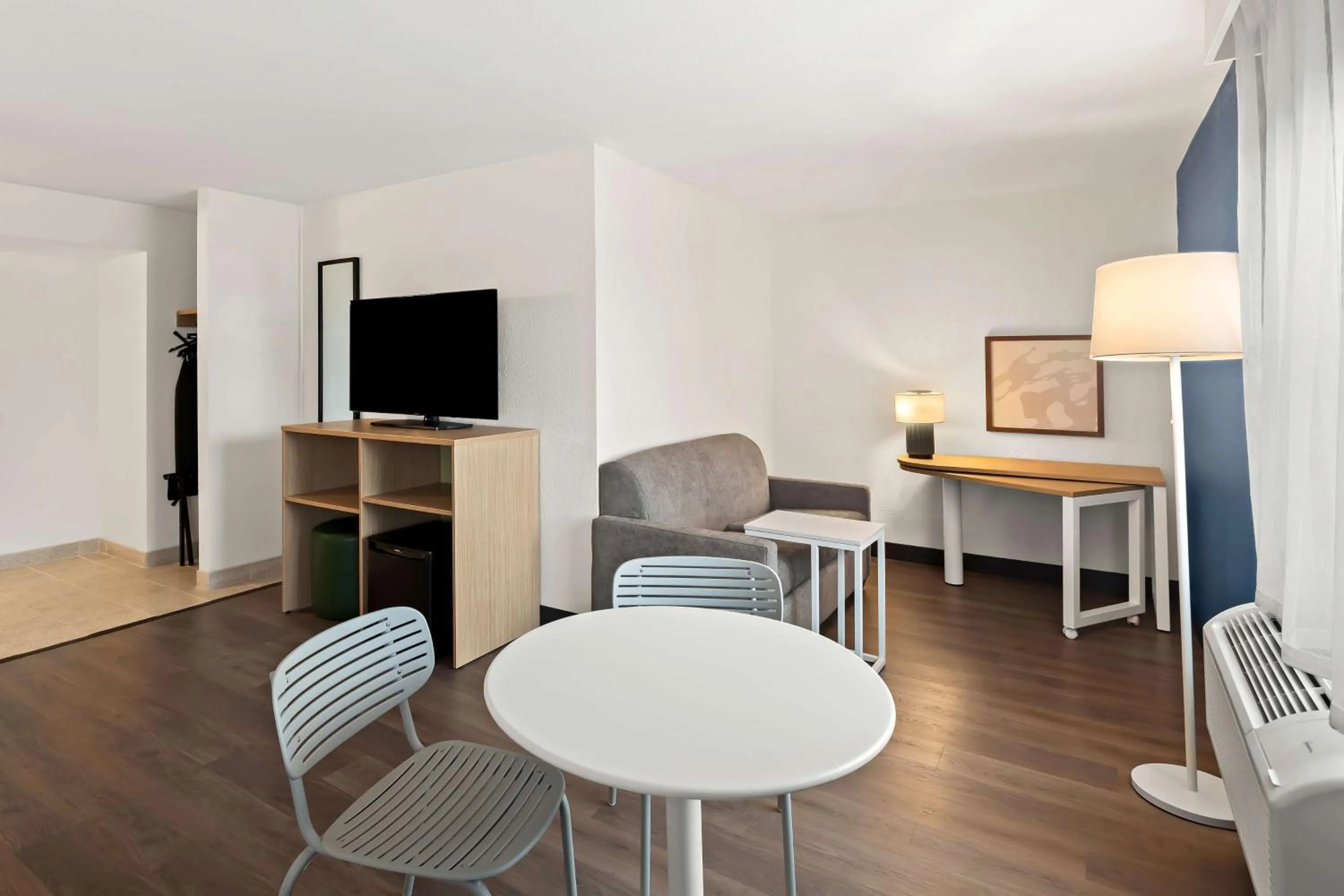 Living room in Spark by Hilton Wichita East