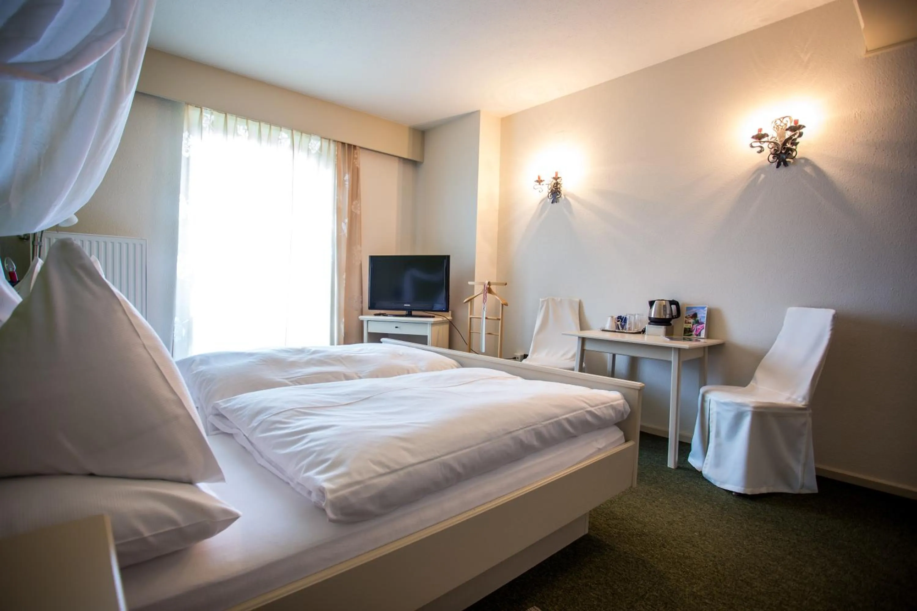 Photo of the whole room, Bed in Panoramahotel Steirerland