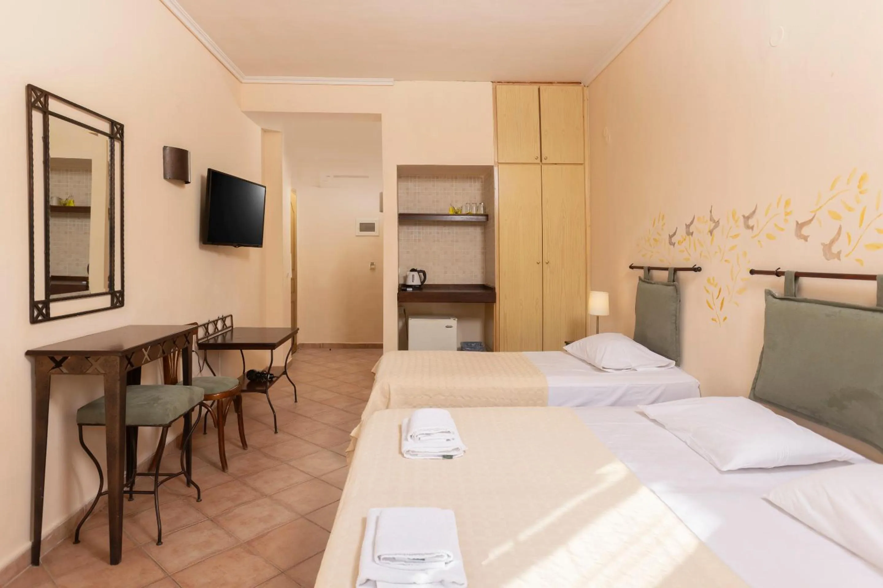 Bed in Ammon Garden Hotel