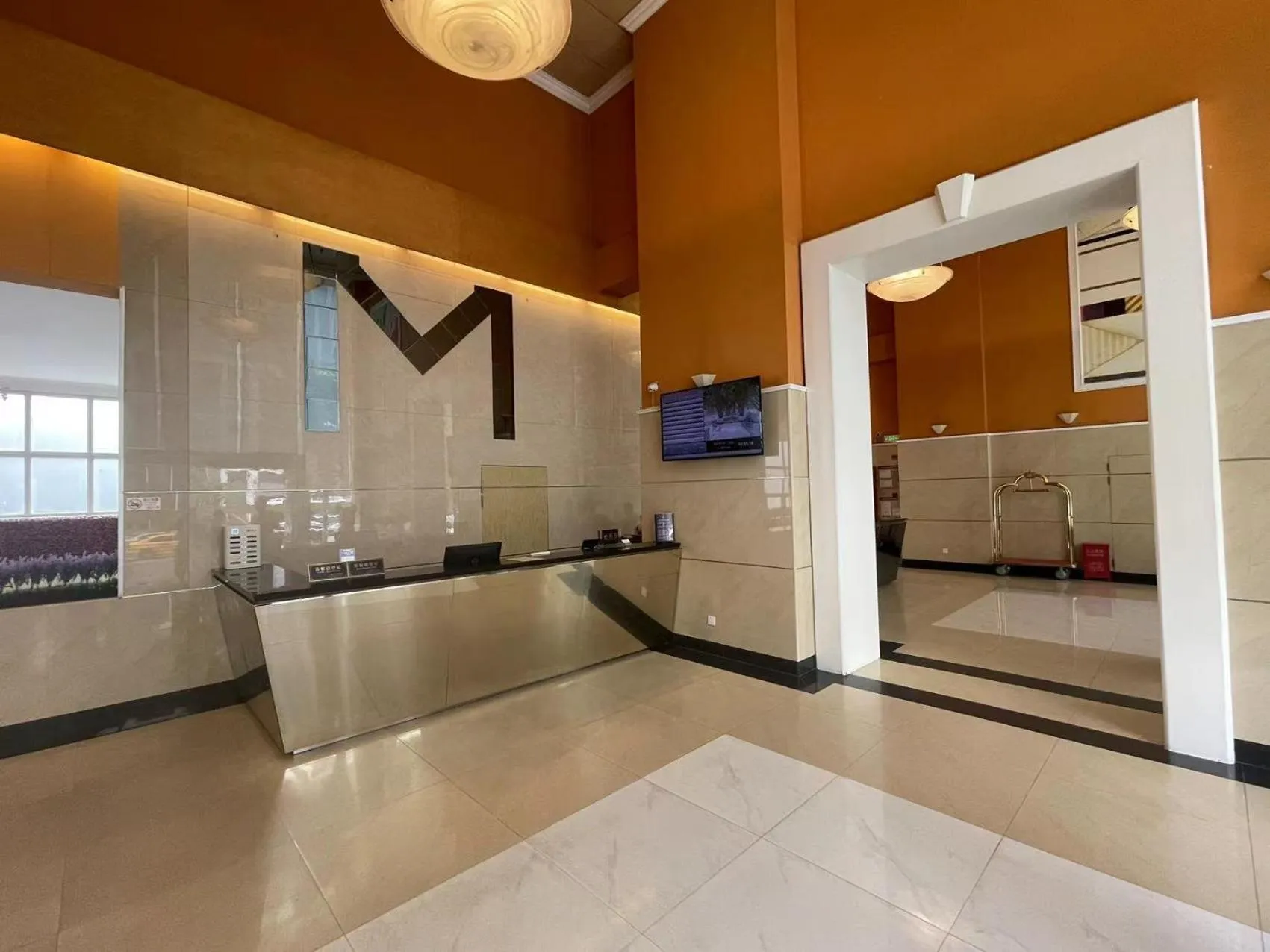 Lobby or reception in Magnificent International Hotel