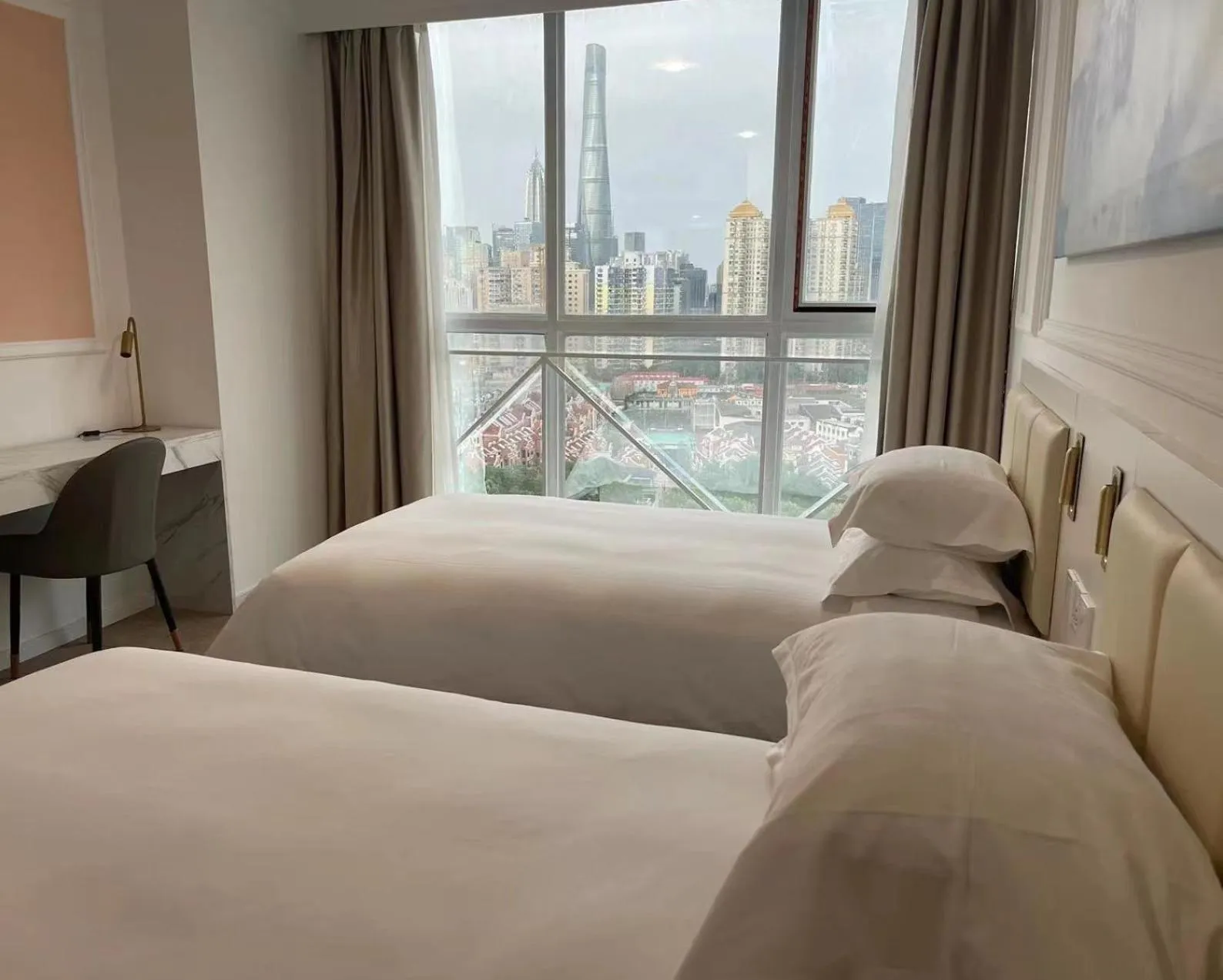 View (from property/room), Bed in Magnificent International Hotel