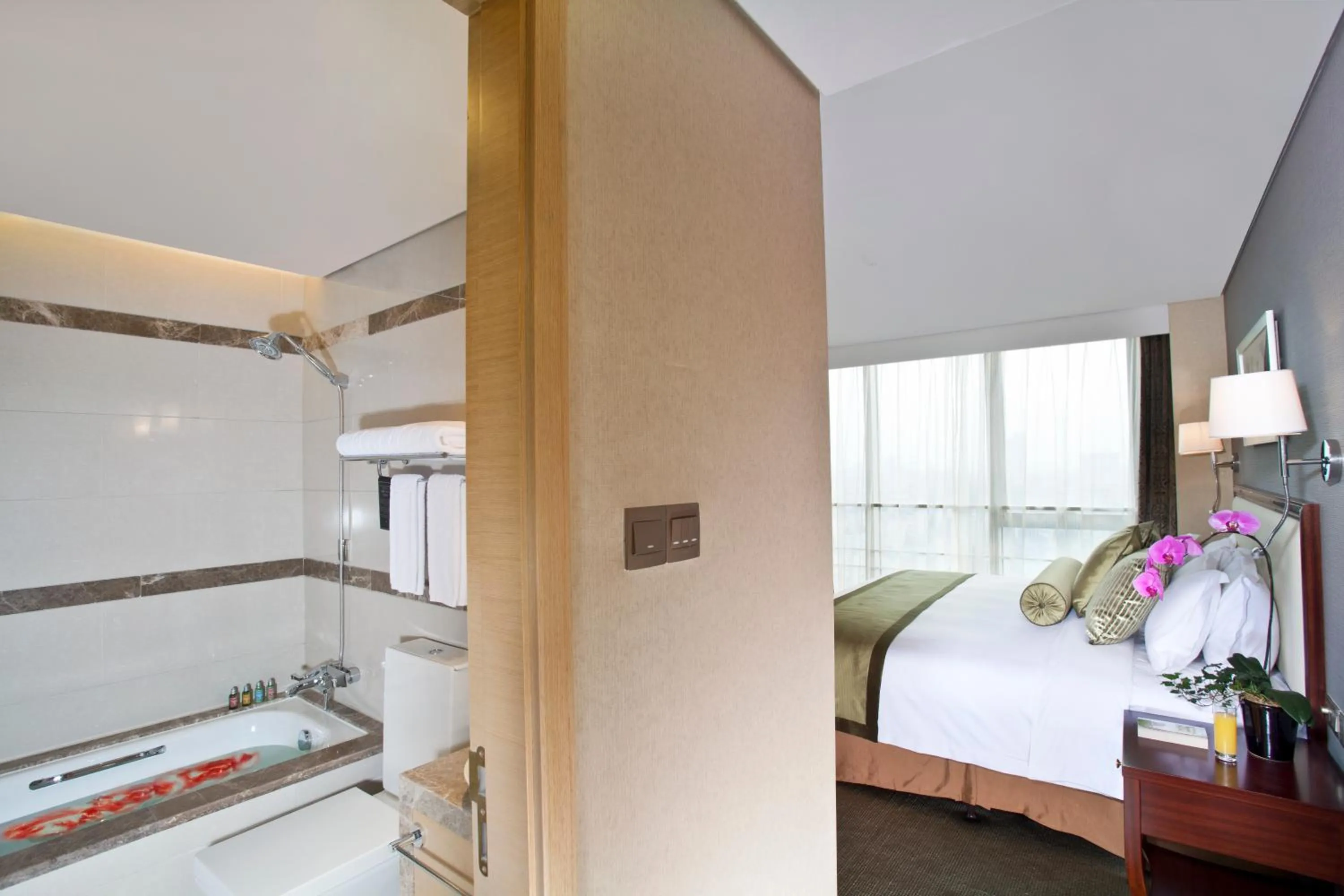 Bedroom in Regal Plaza Hotel & Residence