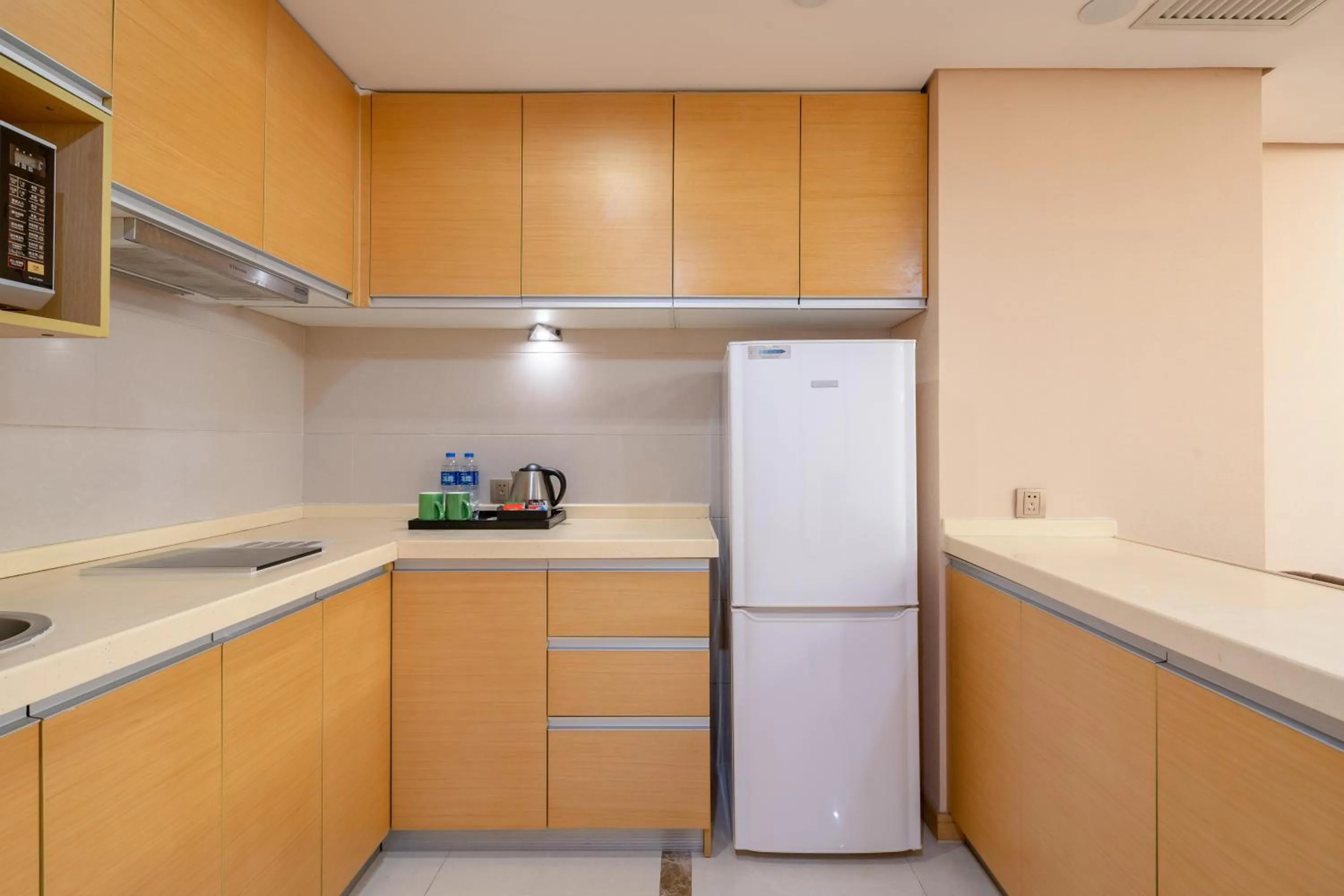 Kitchen or kitchenette in Regal Plaza Hotel & Residence