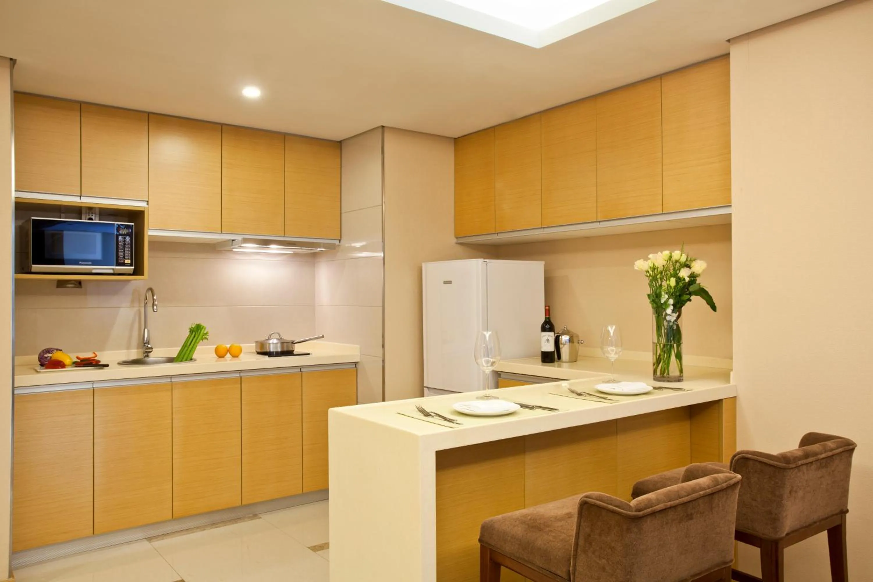 Kitchen or kitchenette in Regal Plaza Hotel & Residence